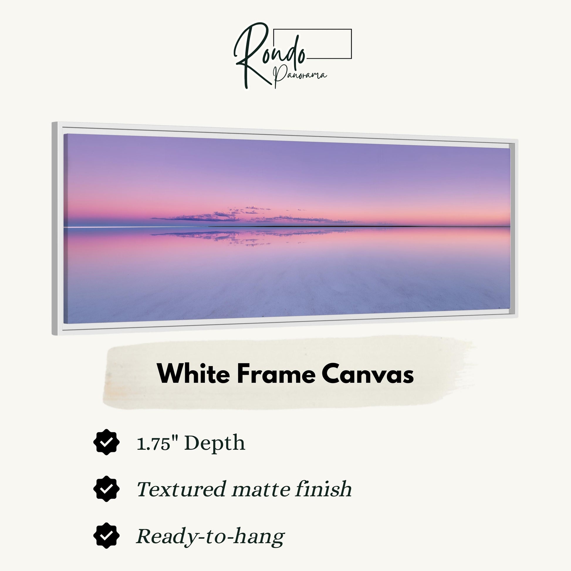 The image is a white frame canvas depicting a serene landscape with a calm body of water reflecting the colors of the sky at sunset.