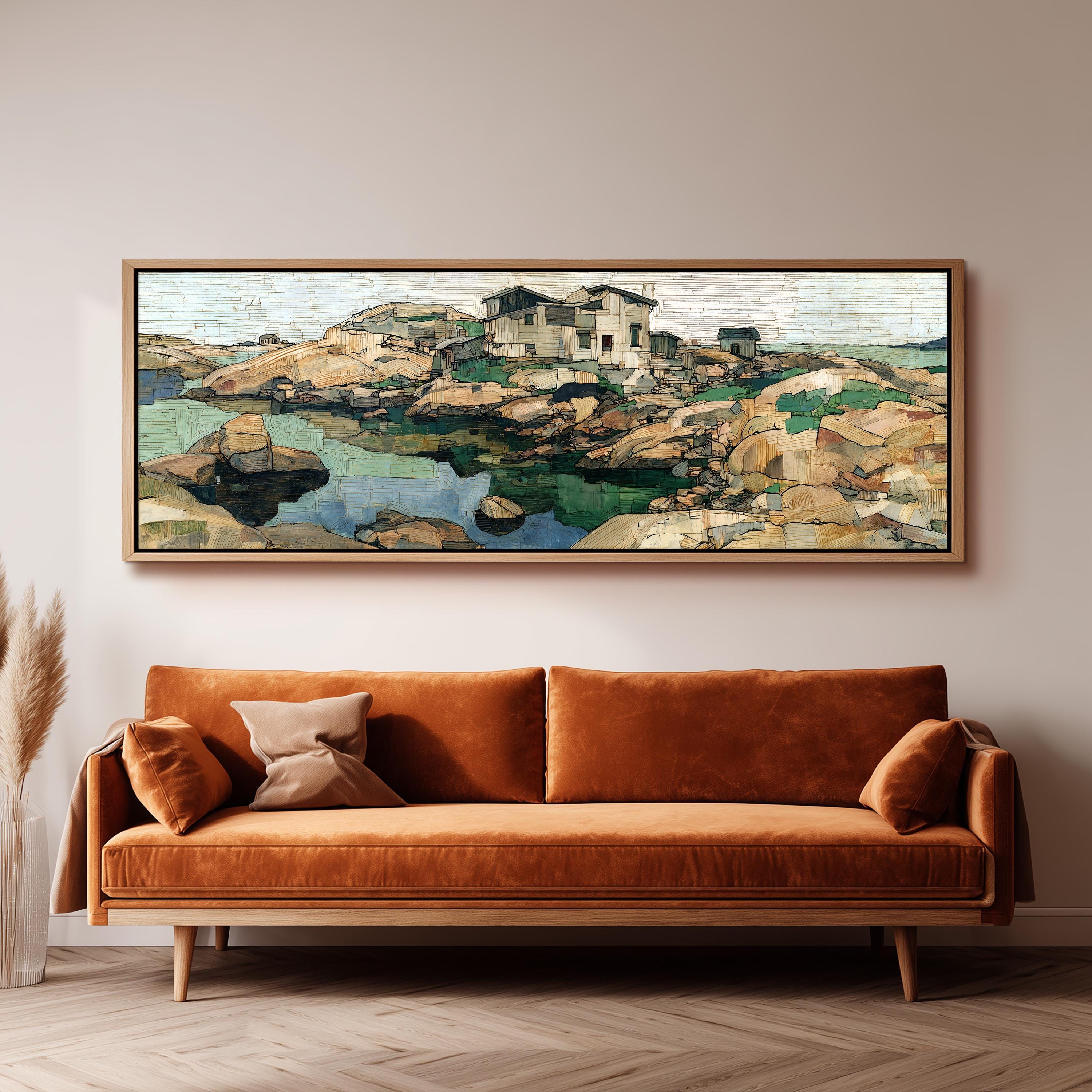 a large, framed painting of a coastal landscape hanging on a wall above a brown sofa.