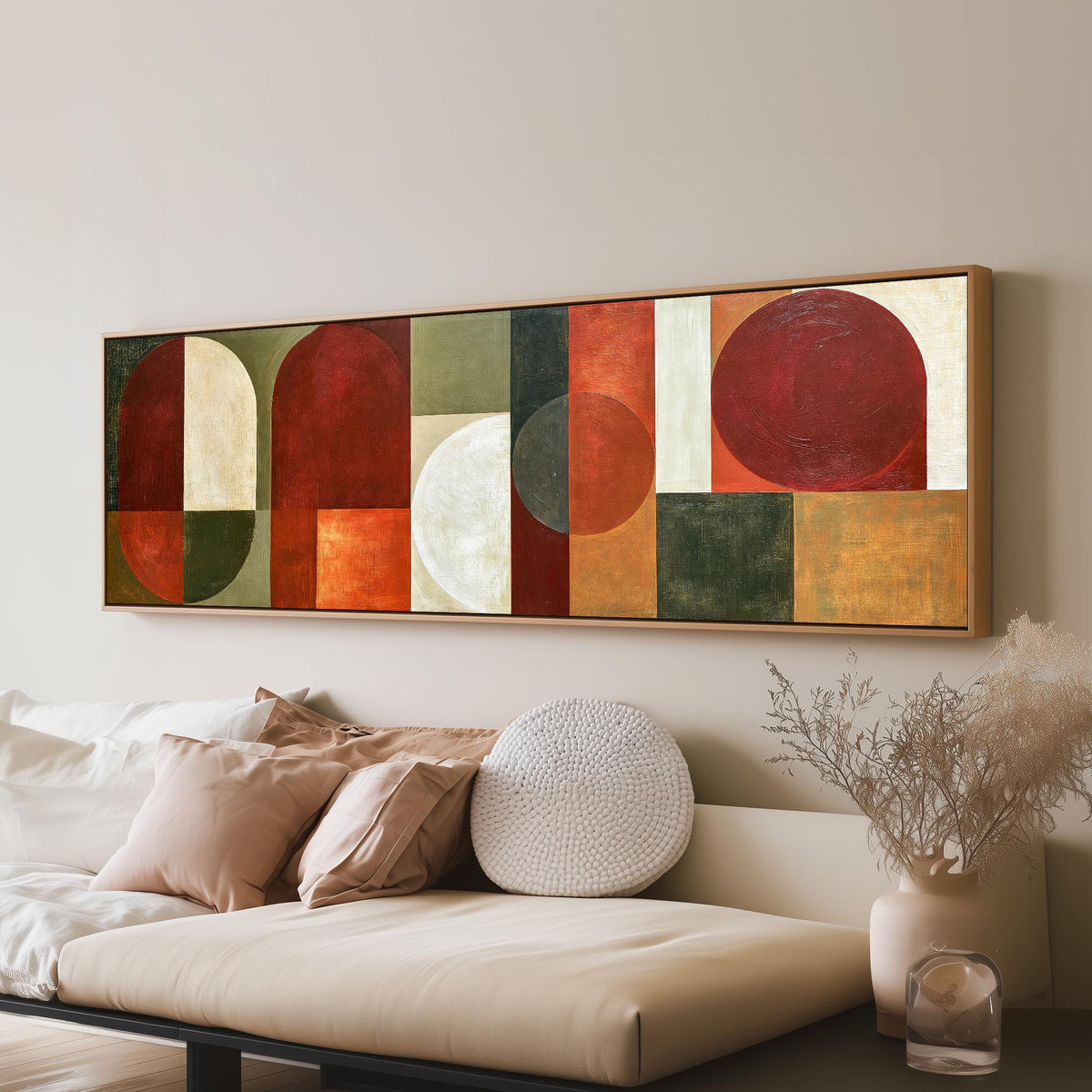 Maroon and olive geometric arches panoramic canvas print above a sofa in a living room