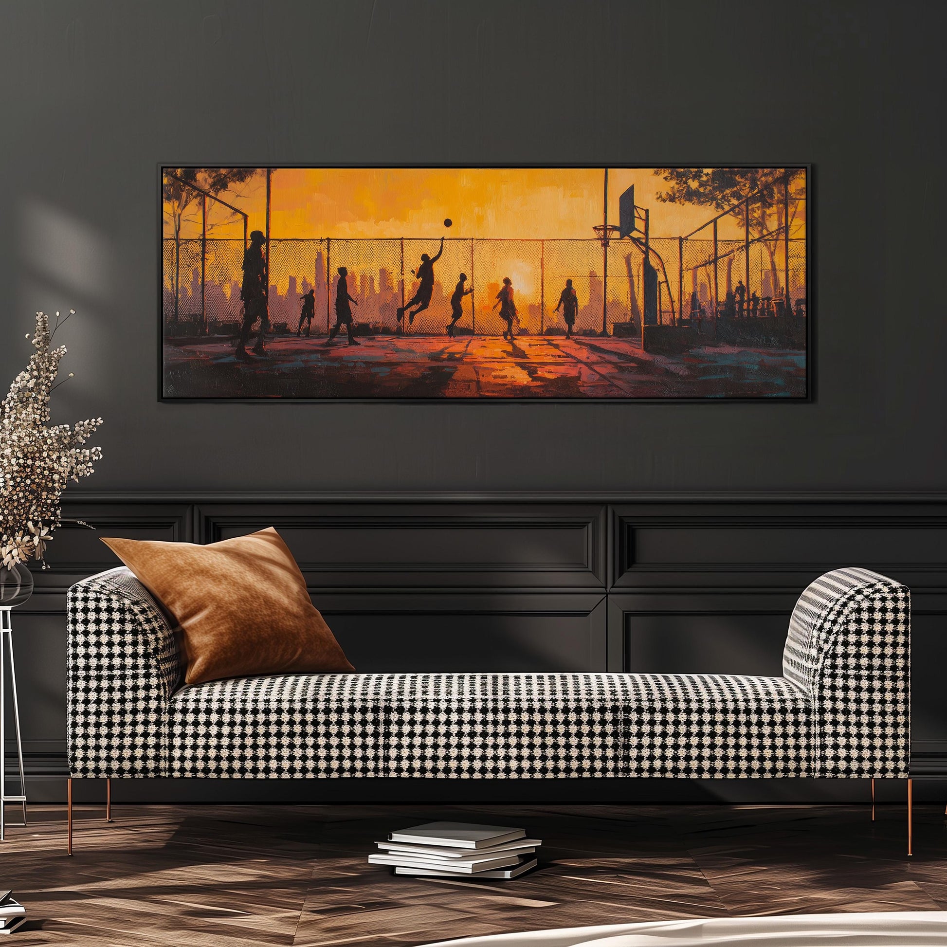 a large painting of people playing basketball on a court, with a cityscape in the background. The painting is hung on a wall above a black and white checkered sofa, which is positioned in front of a bookshelf.