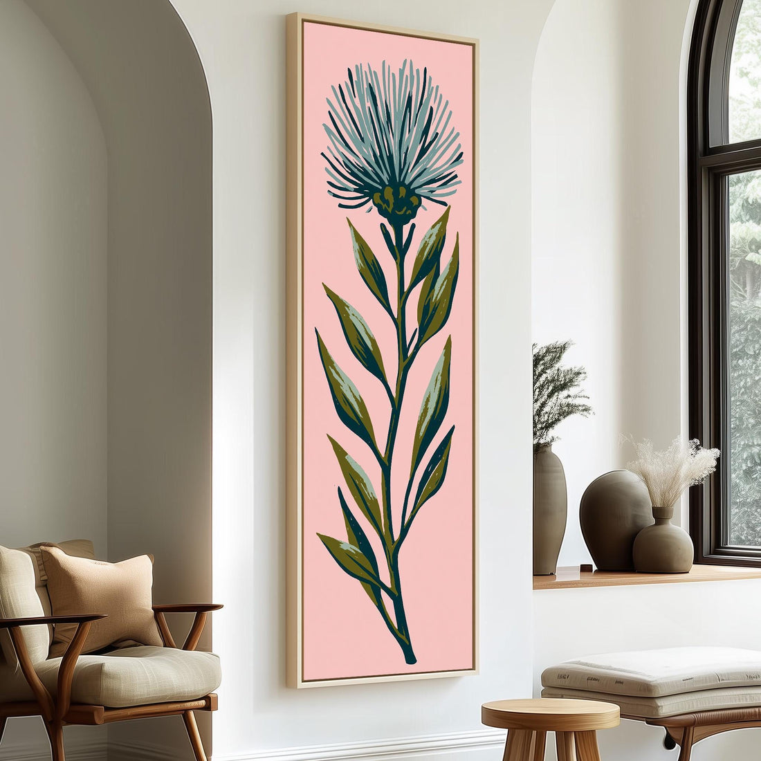 Blue thistle flower on blush pink long vertical canvas print in a sunlit living space