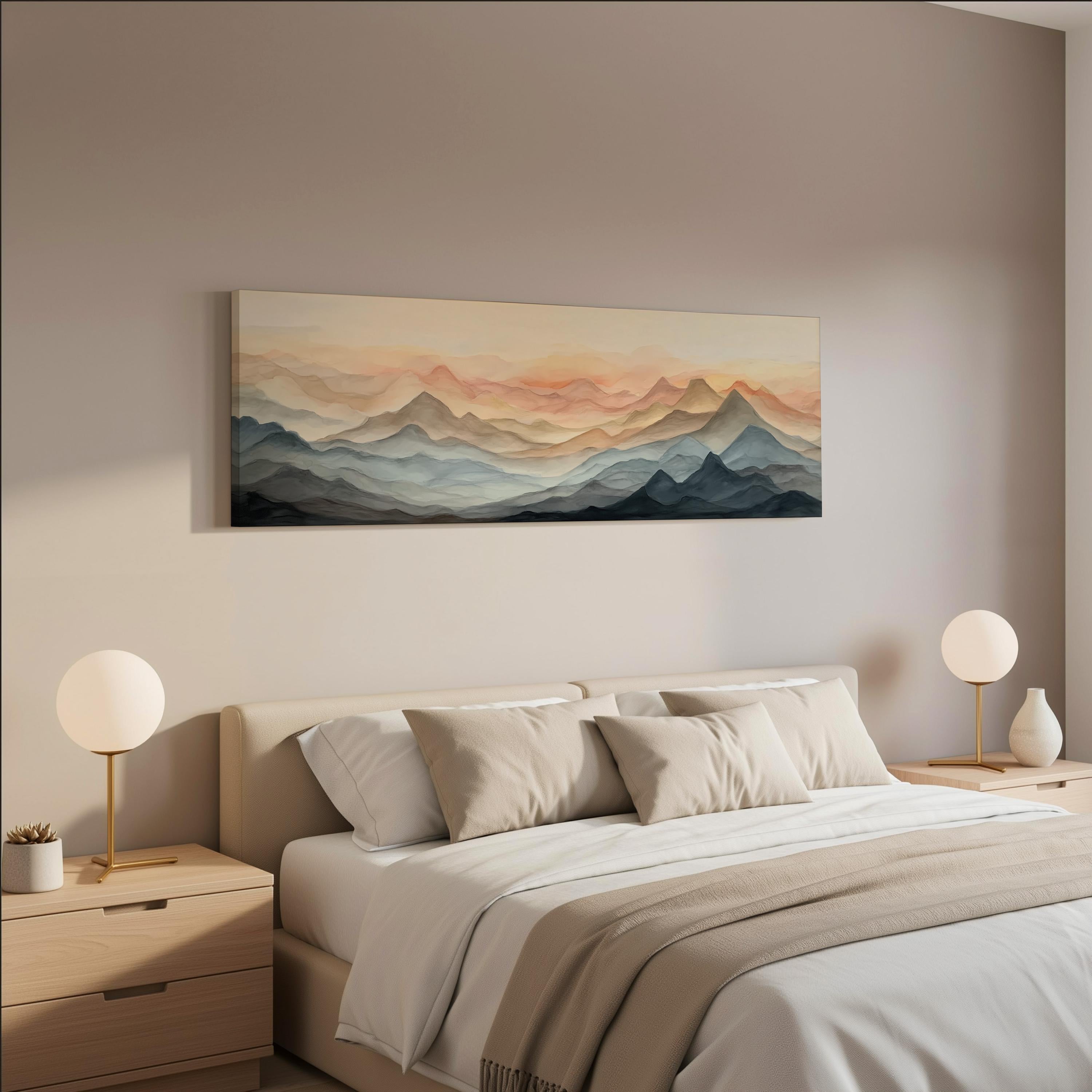 a serene bedroom scene with a large bed adorned with white linens and beige throw pillows. Above the bed, a large painting of a mountain landscape with a warm, orange and yellow gradient is displayed on the wall. The room features a minimalist design with two white lamps on nightstands, and the overall color scheme is predominantly neutral, creating a calm and peaceful atmosphere.