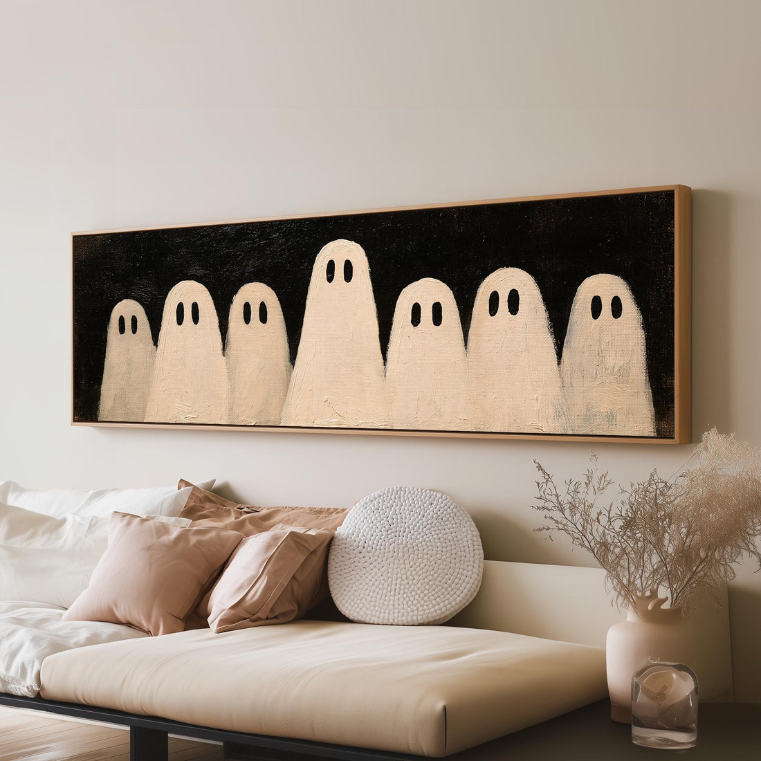 Friendly ghost gang long horizontal canvas print above a sofa in a living room