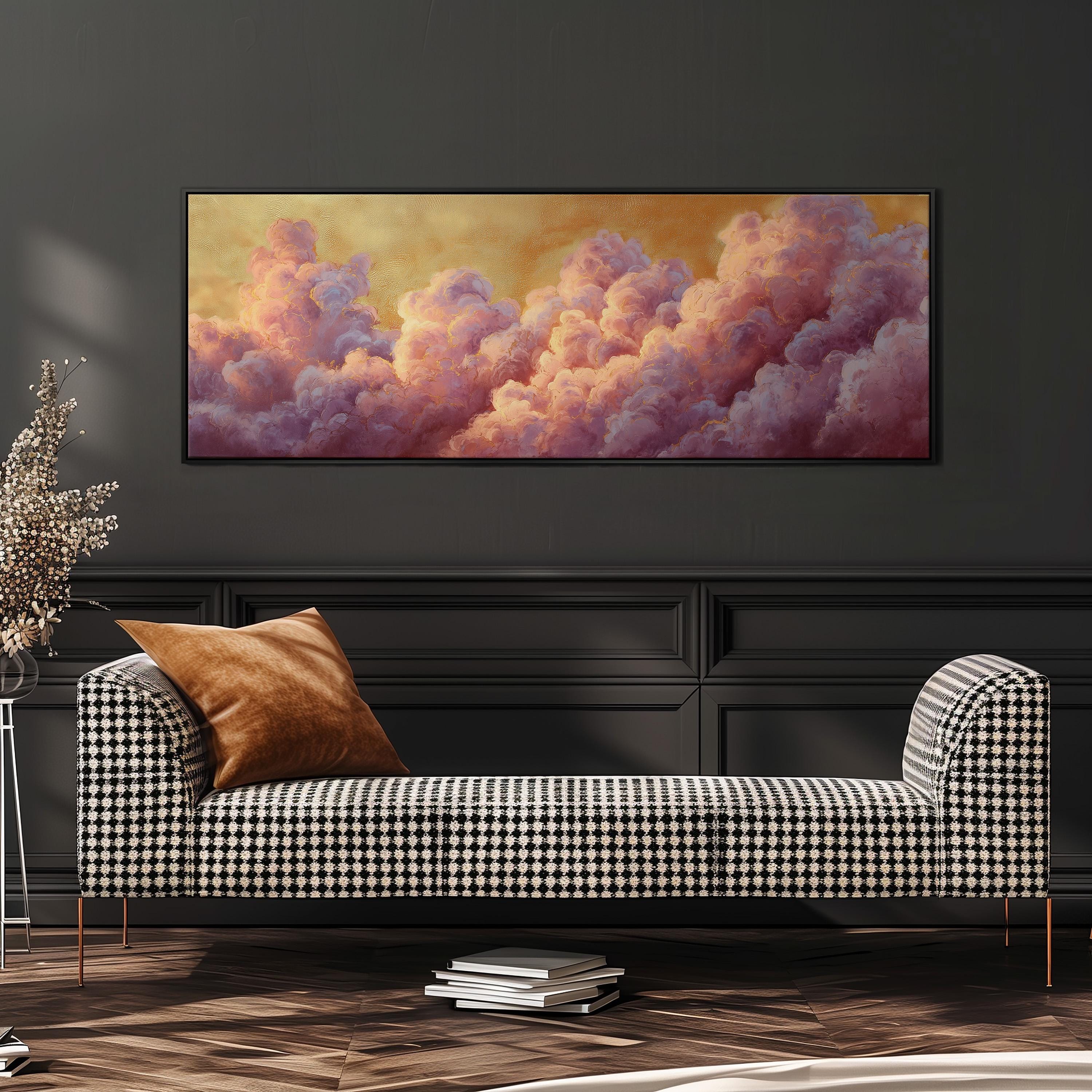 a large, rectangular painting of a cloud-filled sky hanging on a wall above a black and white checkered sofa.