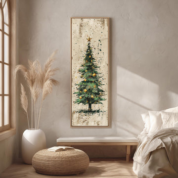 a cozy living room with a large framed painting of a Christmas tree hanging on the wall. The room has a comfortable bed, a wicker ottoman, and a potted plant, creating a warm and inviting atmosphere.