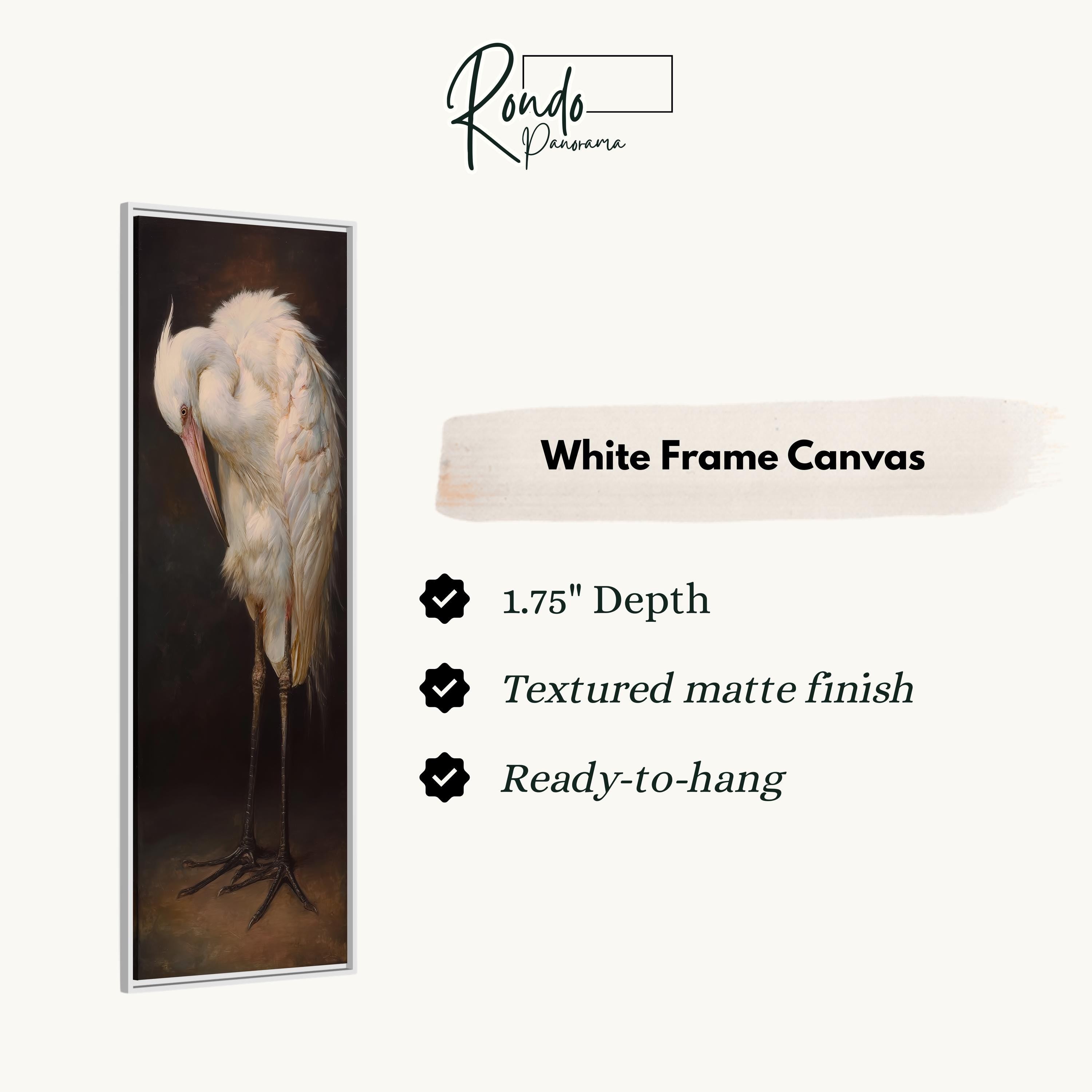 a white frame canvas with a painting of a white crane standing on one leg.