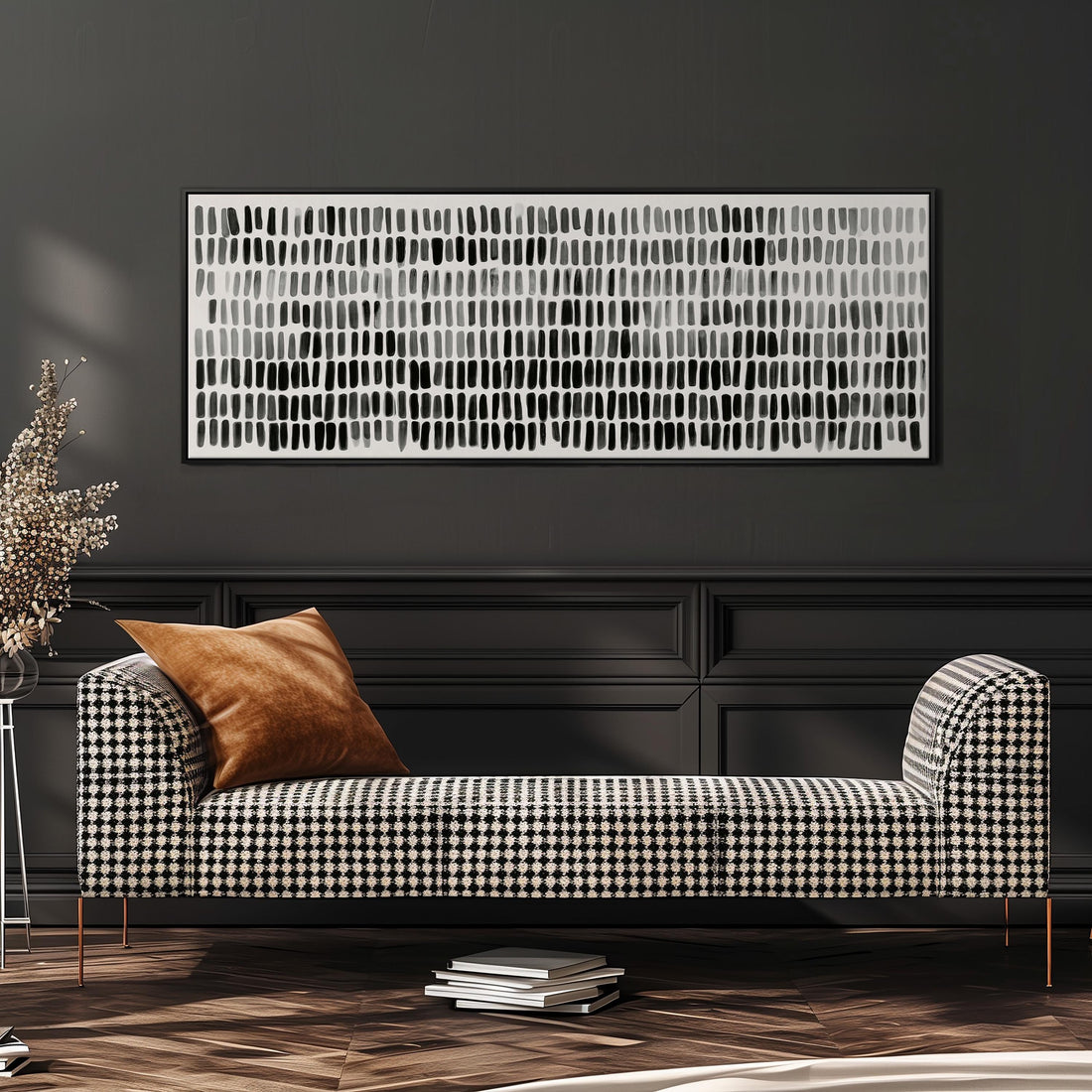 Grid of black and grey brushmarks long horizontal canvas print above a sofa in a living room