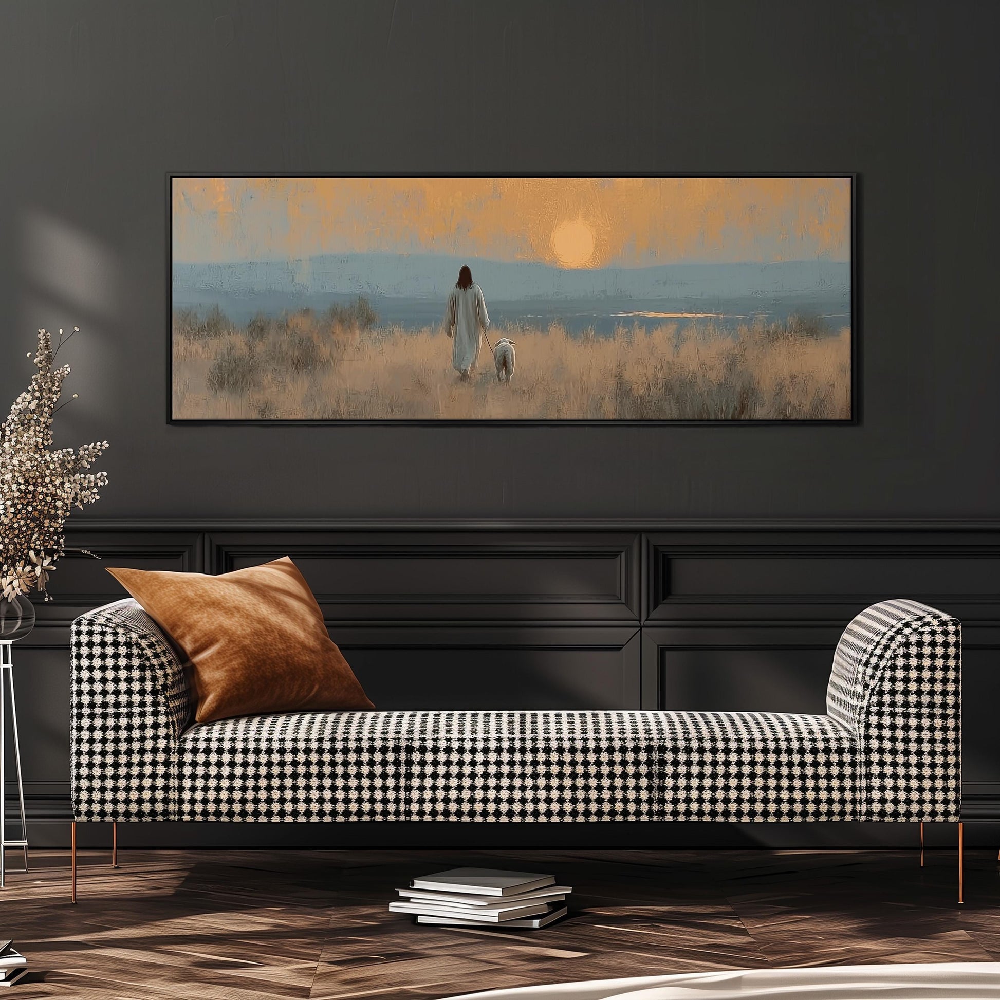 a large painting of a person walking in a field with a dog, hanging on a wall above a black and white checkered sofa.