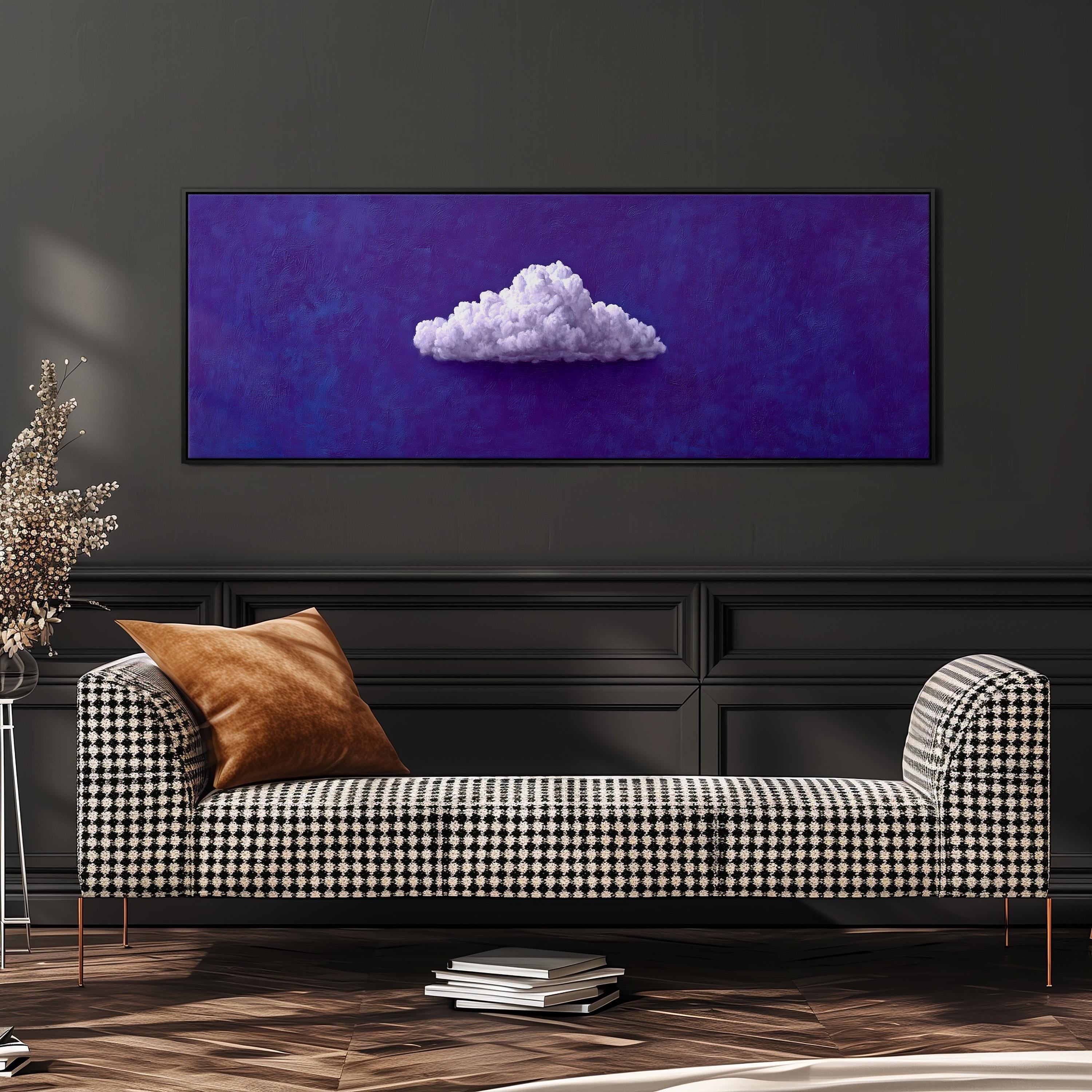 a black and white checkered sofa with a brown throw pillow, set against a dark wall with a large framed painting of a cloud hanging above it.