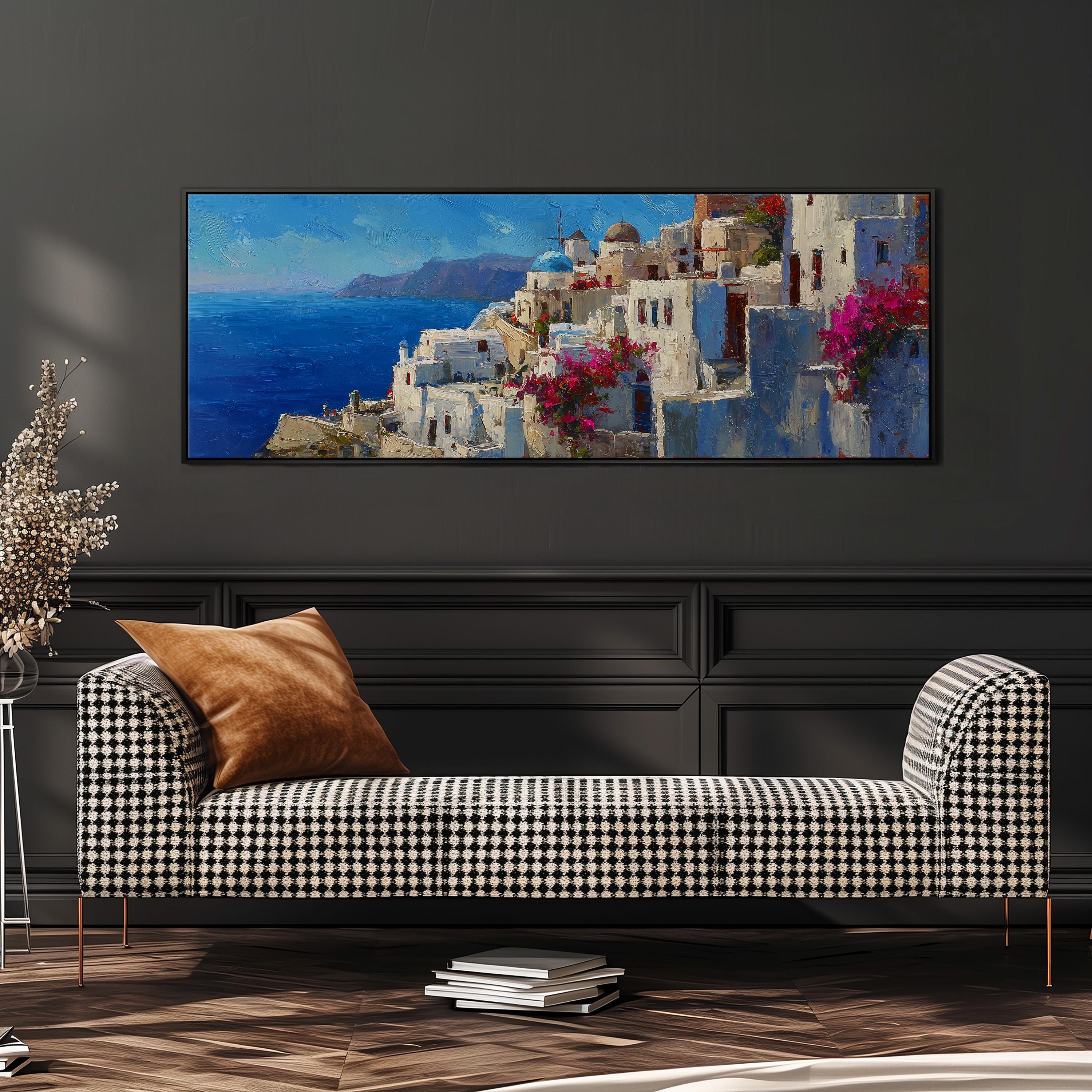 a large, colorful painting of a coastal town with white buildings and pink flowers, hanging on a wall above a black and white checkered sofa.