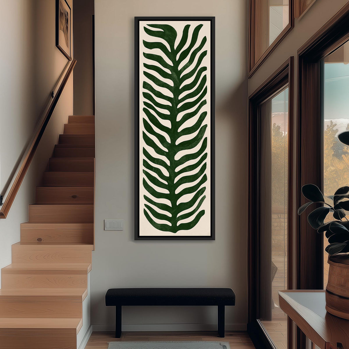 Stylized dark green fern leaf tall narrow canvas print beside a staircase in an entryway