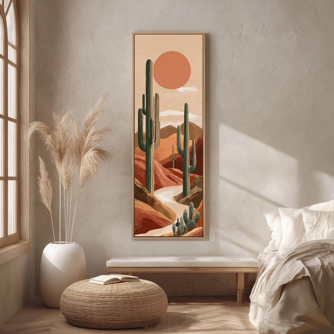a serene desert landscape with a large cactus painting hanging on the wall, a white bench, a woven ottoman, and a window with a plant in a white pot.