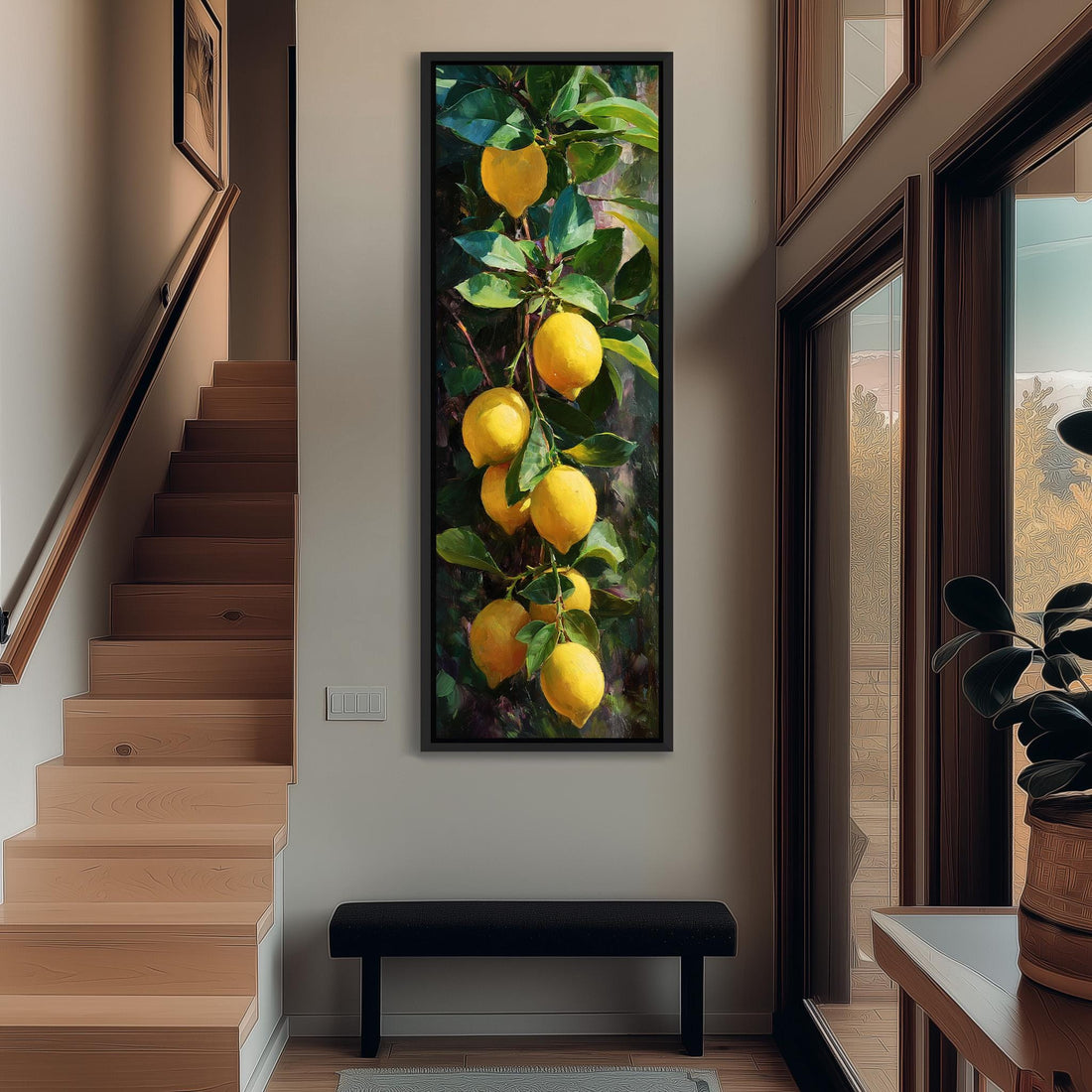 A framed painting of a lemon tree hangs on a wall, with several lemons hanging from the branches.
