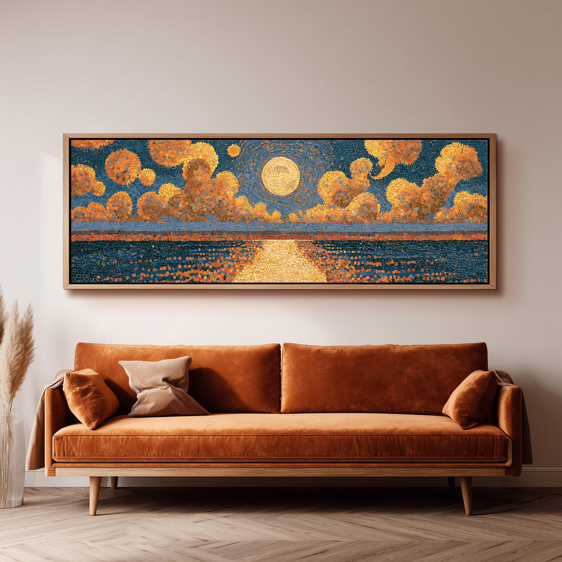 Golden sunset over a lake long horizontal canvas print above a sofa in a living room