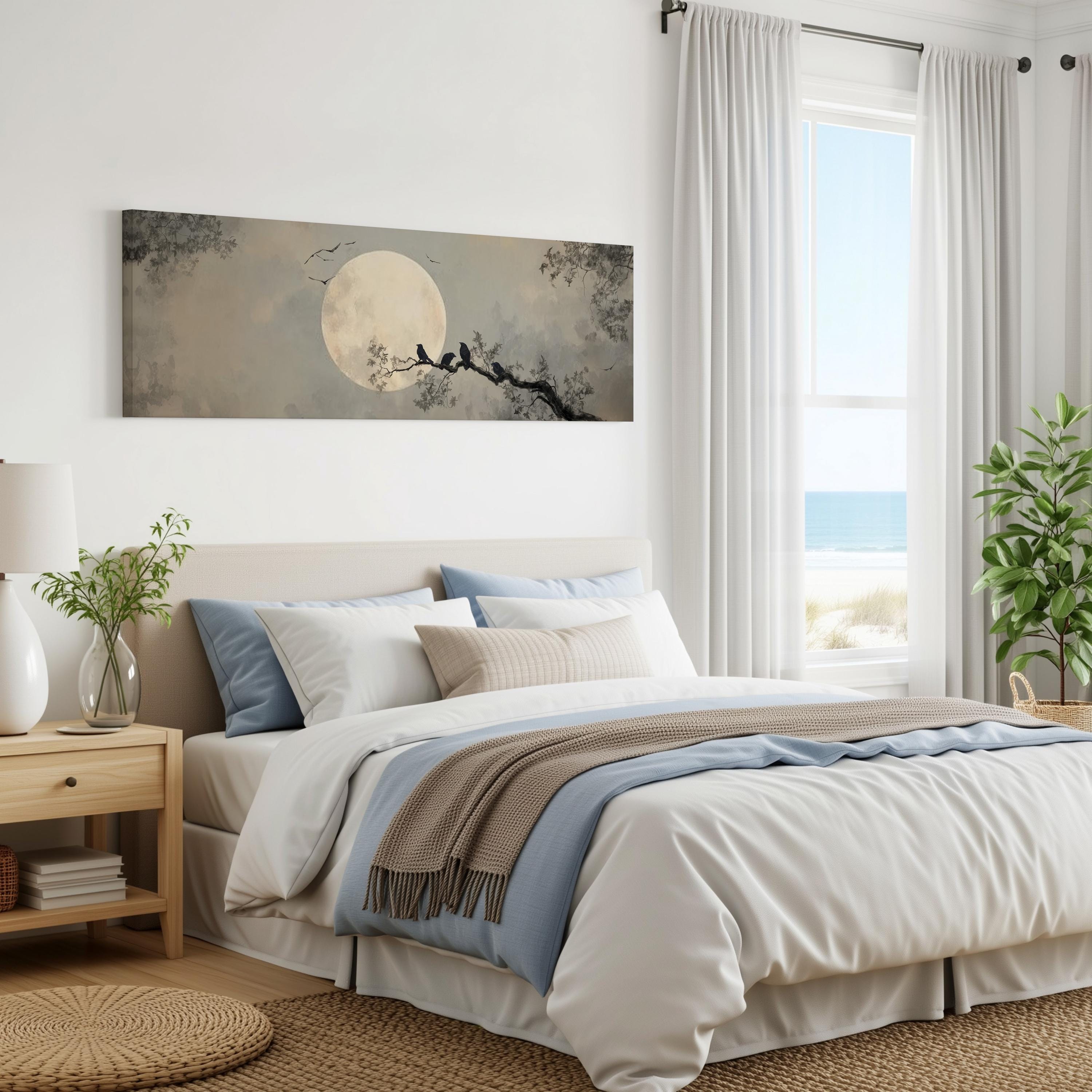 a serene bedroom scene with a large bed, a nightstand, and a painting of a moonlit tree branch with birds perched on it. The room has white walls, a large window with white curtains, and a view of the ocean.