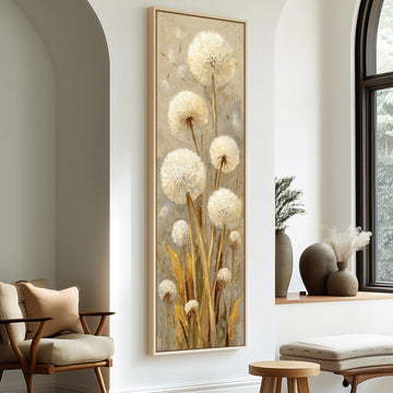 a large painting of dandelions hanging on a wall in a room with a wooden chair, a small table, and a window.