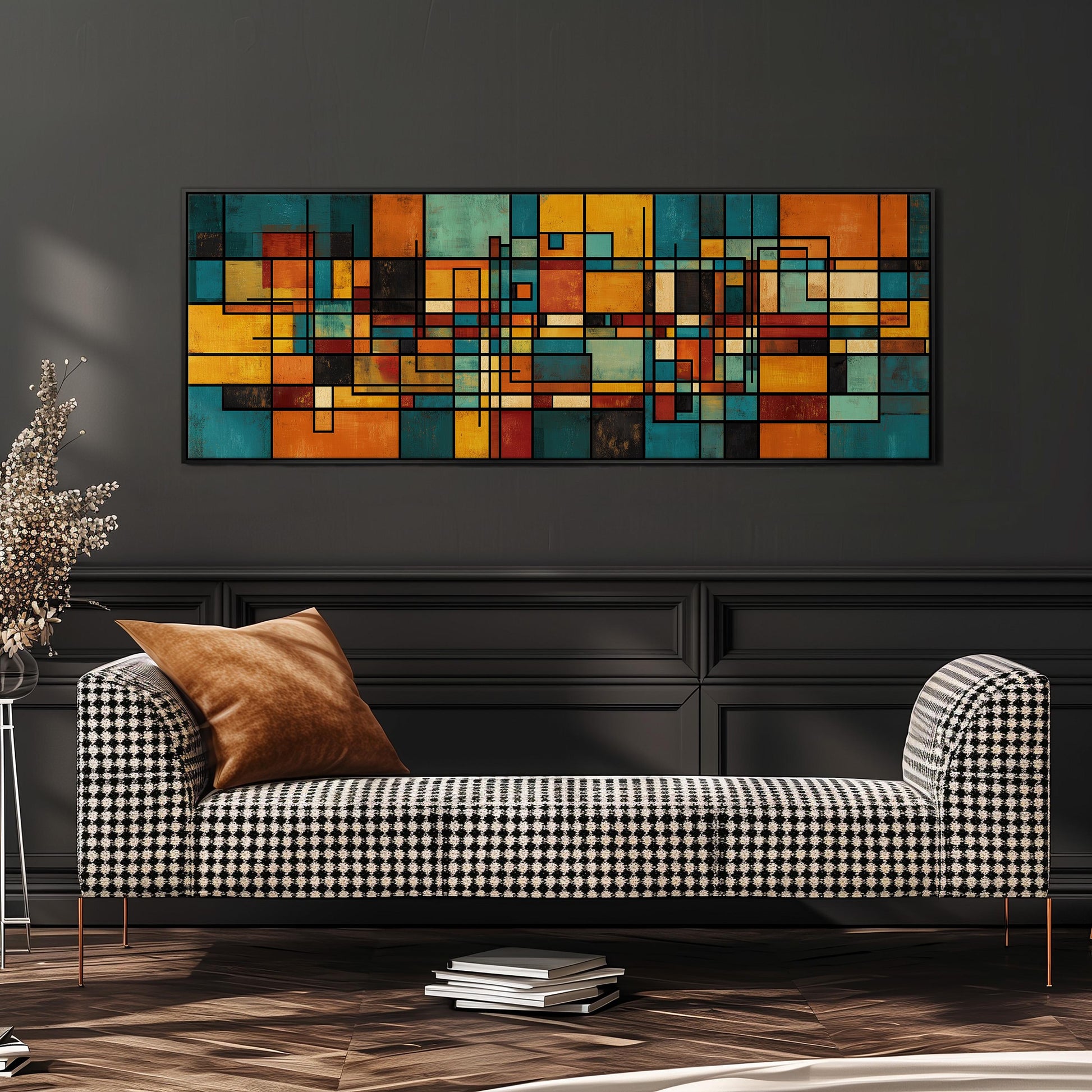 a modern living room with a black and white checkered sofa, a stack of books, and a large abstract painting on the wall.