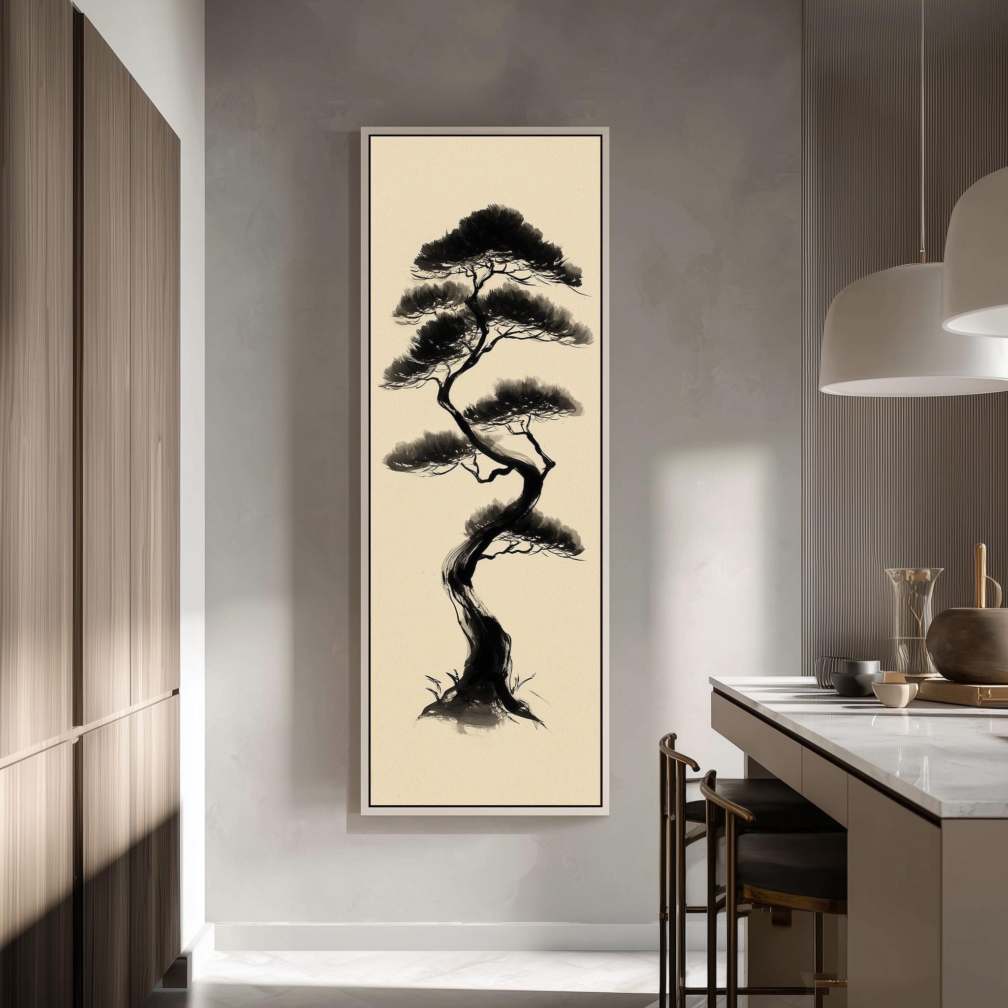 a large black and white painting of a bonsai tree hanging on a wall in a modern kitchen.