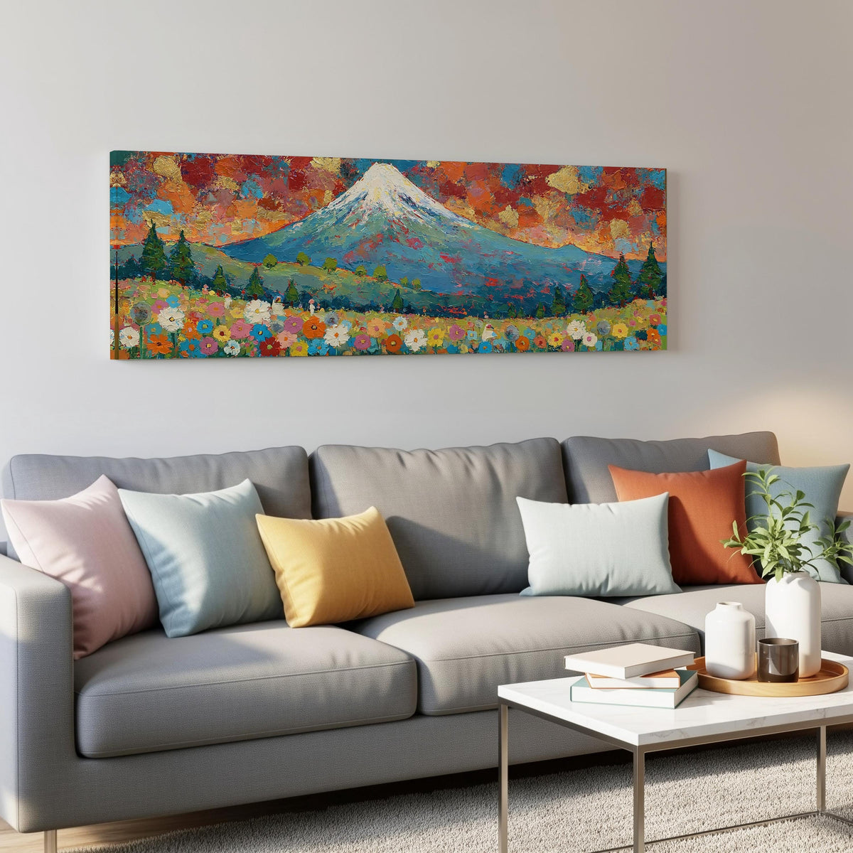 Mount Fuji above autumn trees and wildflowers panoramic canvas print above a grey sofa in a living room