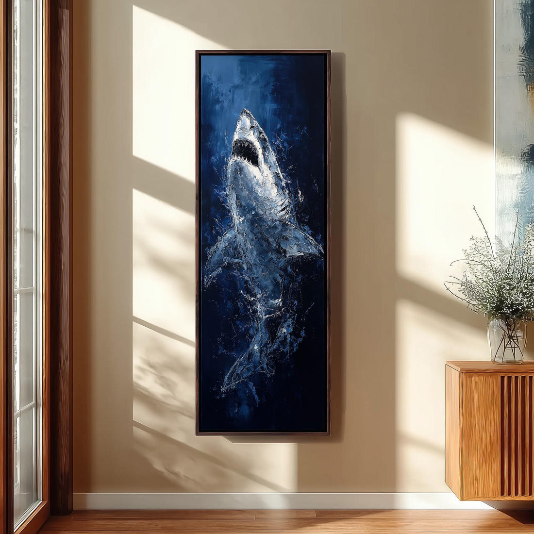a large framed painting of a shark hanging on the wall in a hallway.