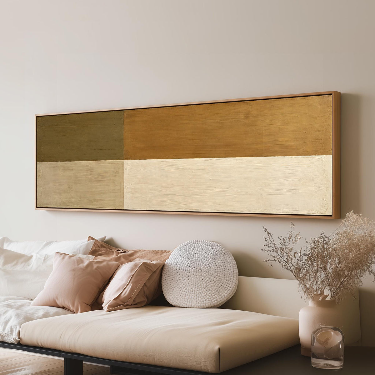 Olive and cream quadrants long horizontal canvas print above a sofa in a living room