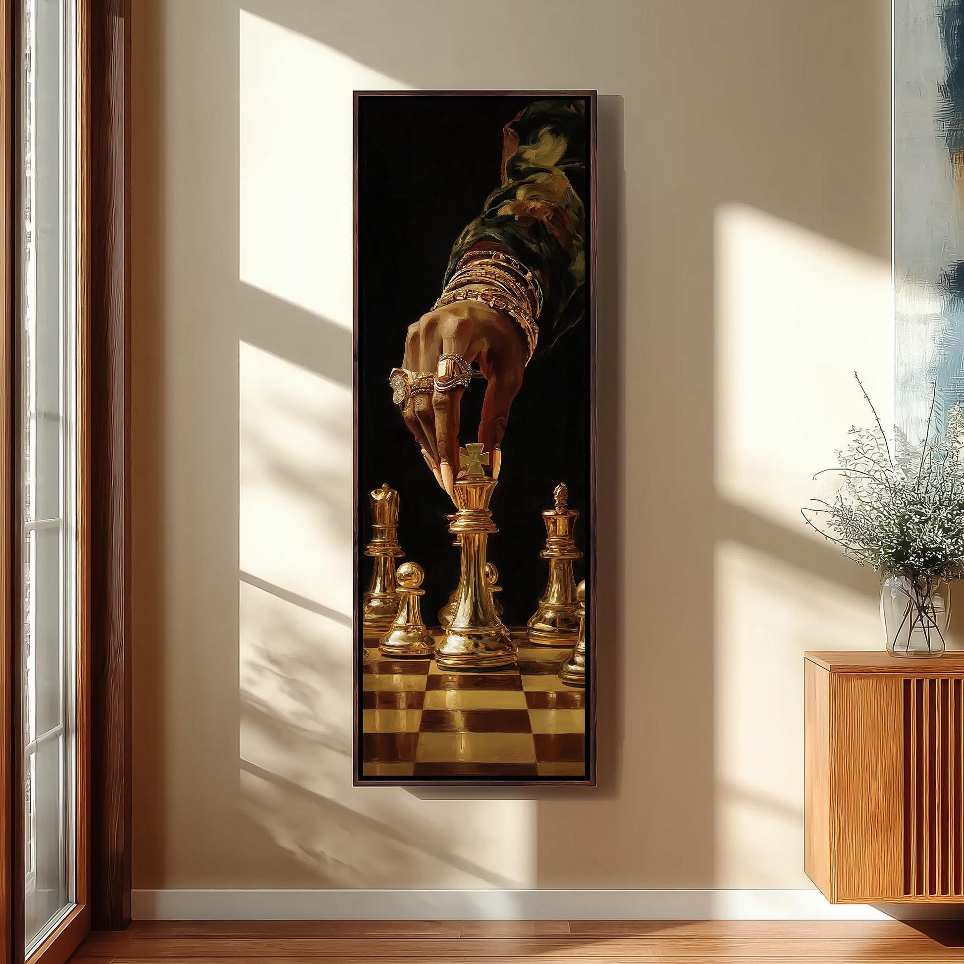 A large framed painting depicting a hand reaching for a chess piece on a chessboard, with the pieces in the foreground and a vase of flowers in the background.
