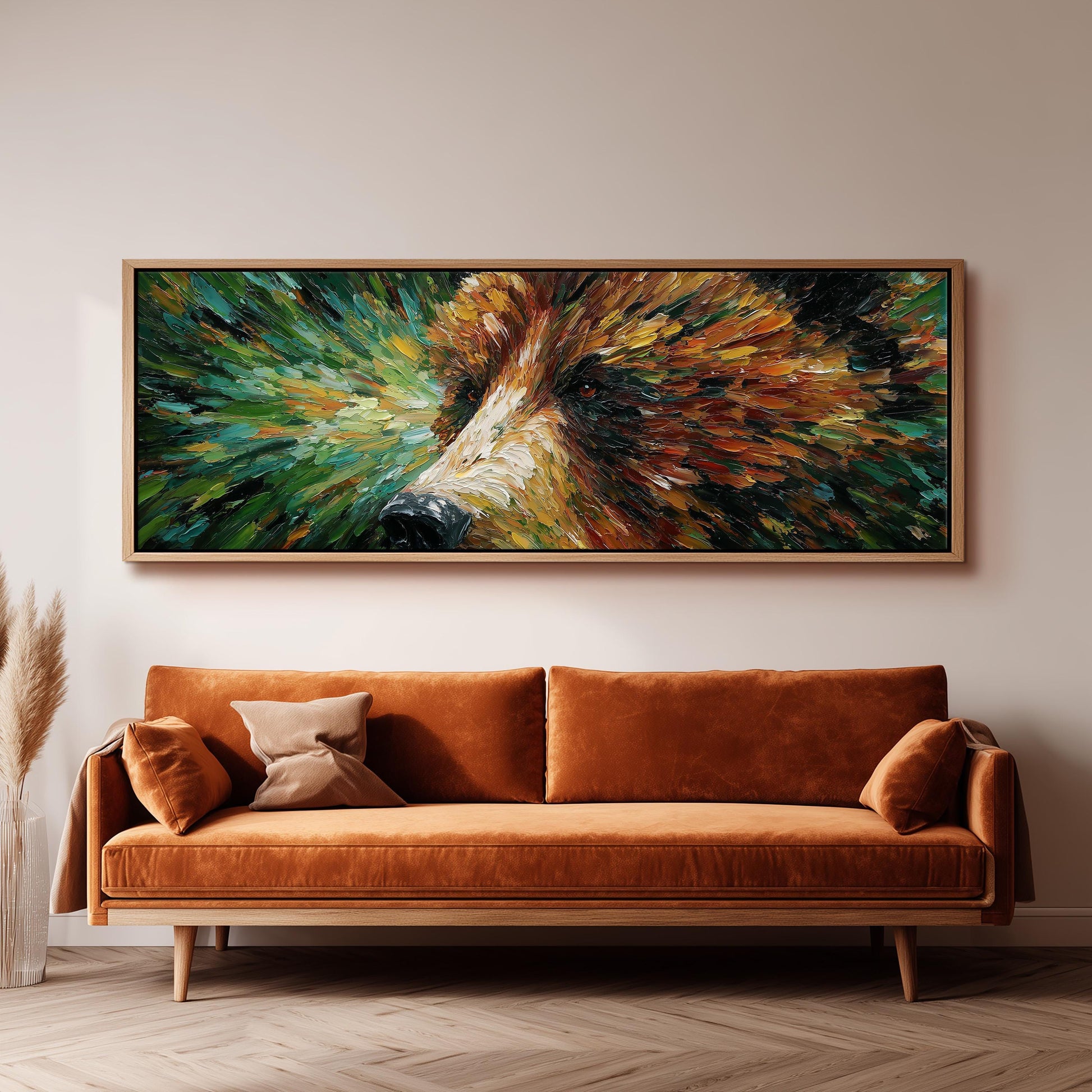 a large, vibrant painting of a bear's face hanging on a wall above a brown sofa.