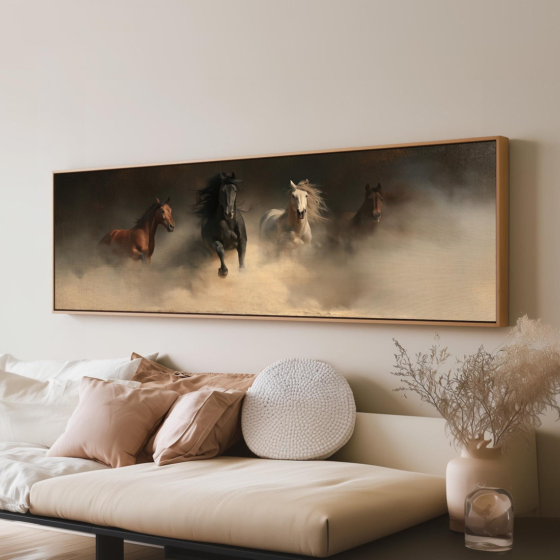 Wild horses running out of the dust long horizontal canvas print above a sofa in a living room