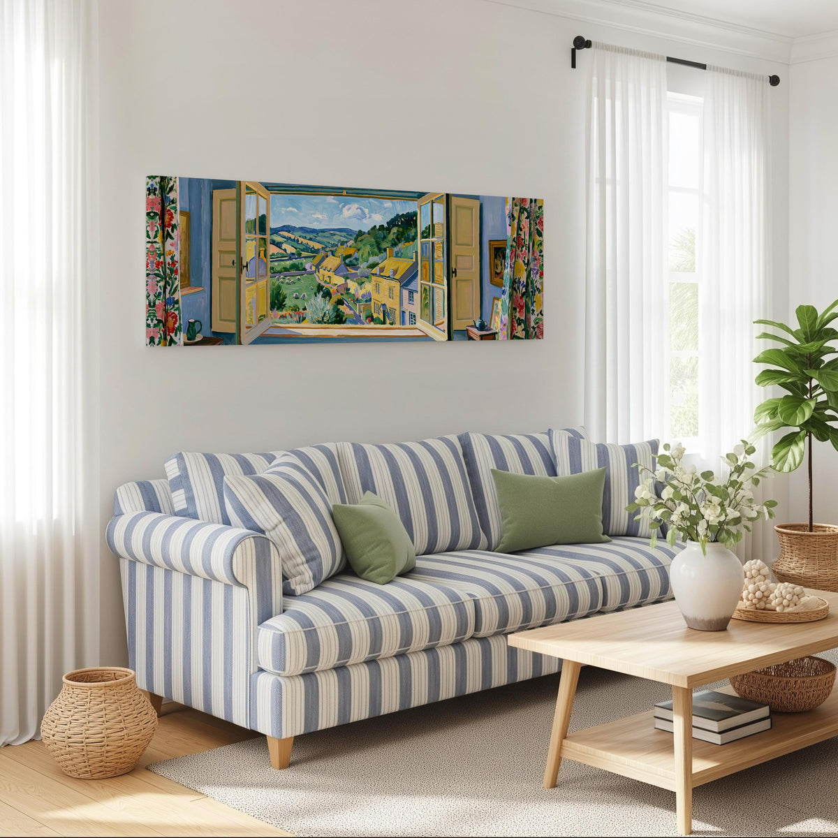 English countryside village through a window long horizontal canvas print above a striped sofa in a coastal living room