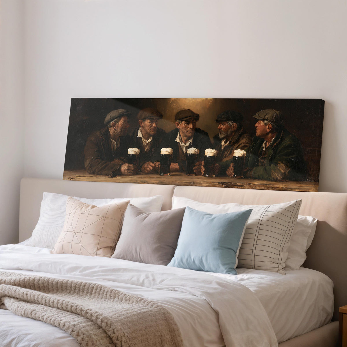 Friends toasting with stout in an Irish pub wide panoramic canvas print above a bed in a bedroom