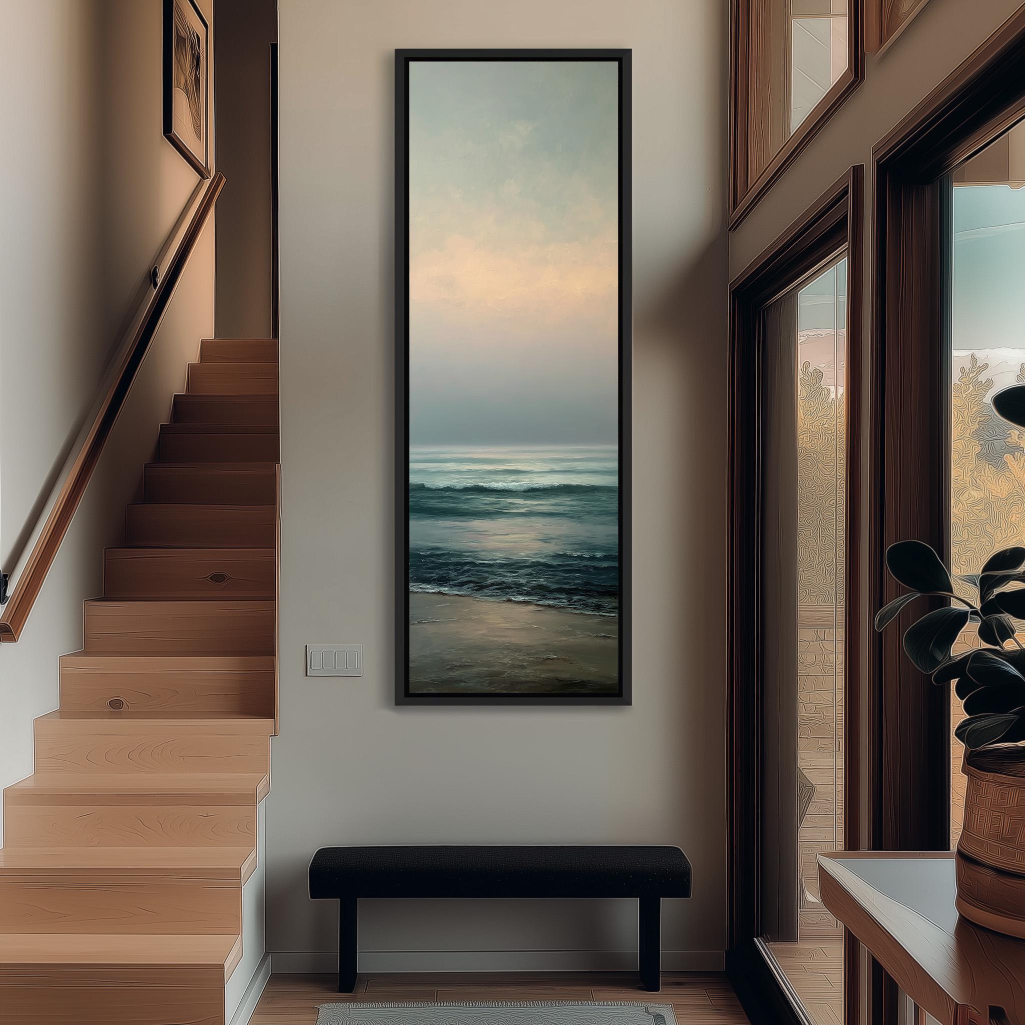 a hallway with a large painting of a beach scene hanging on the wall. The painting depicts a serene beach with waves gently lapping at the shore. The hallway has a wooden staircase leading up to the painting, and a bench is placed in front of the painting. The overall atmosphere of the hallway is calm and peaceful, with the beach painting serving as a focal point.