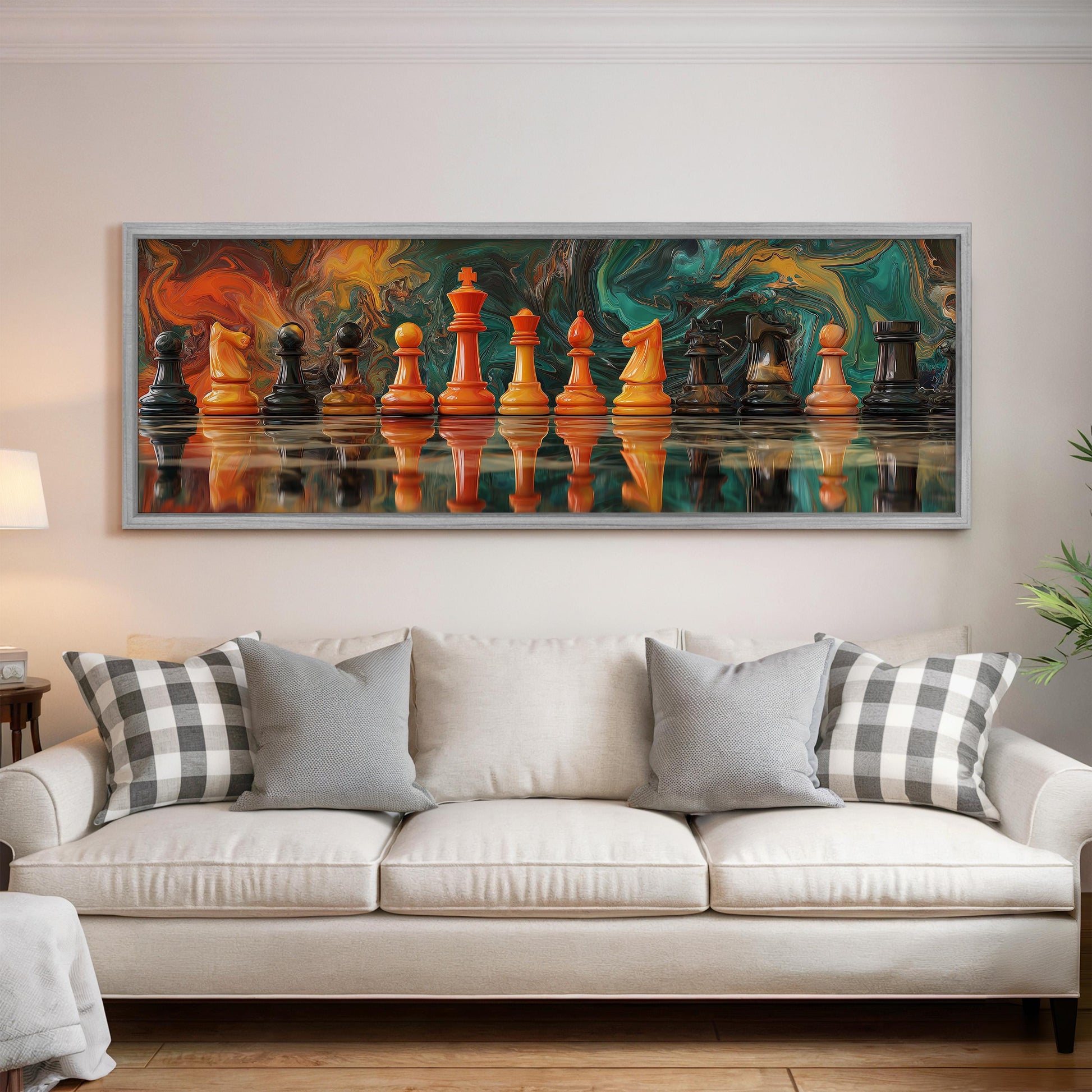 a large, colorful painting of chess pieces arranged in a row on a wall above a white couch with gray and white plaid throw pillows.