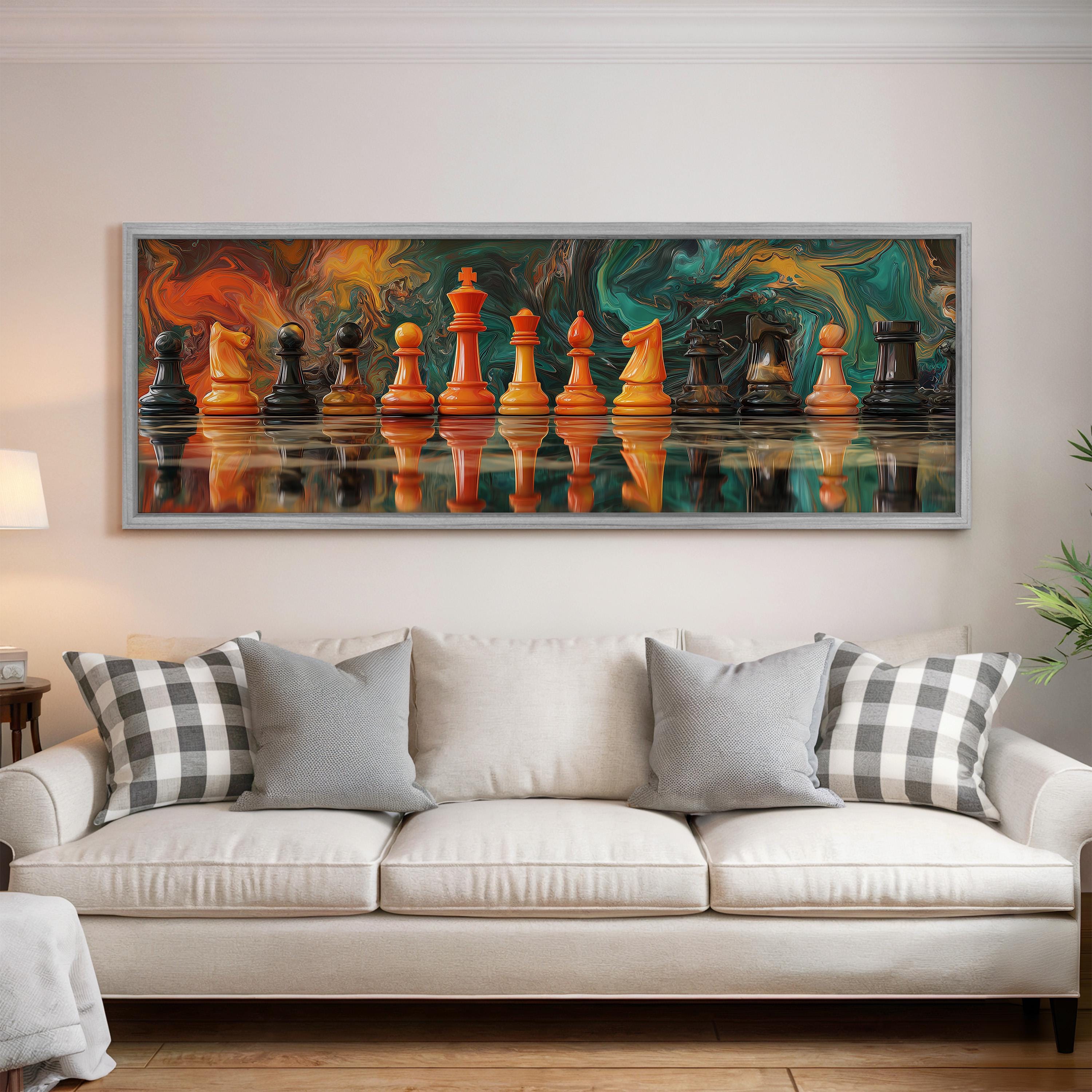 a large, colorful painting of chess pieces arranged in a row on a wall above a white couch with gray and white plaid throw pillows.