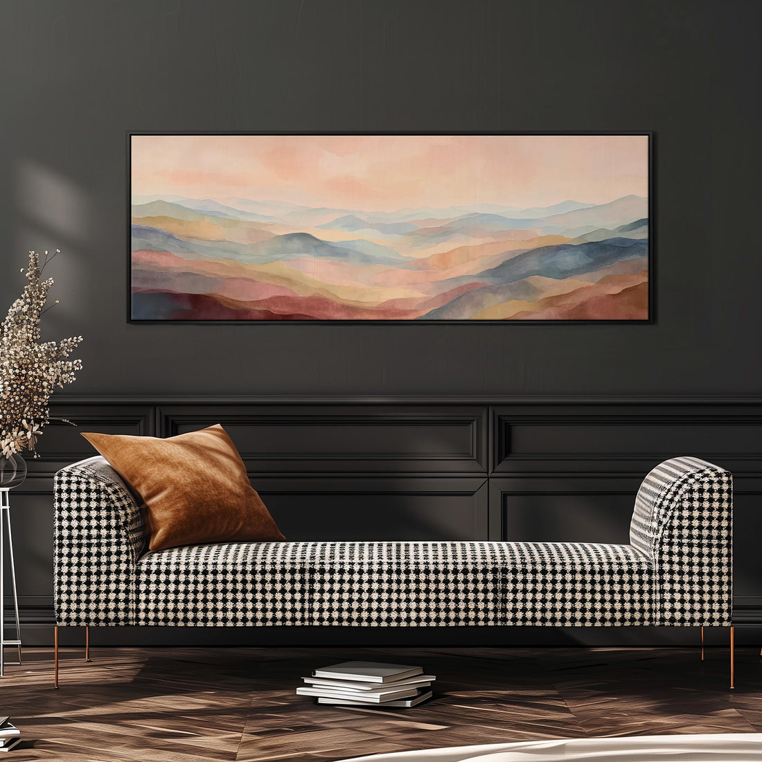 a large, rectangular painting hanging on a wall above a brown sofa with two pillows.