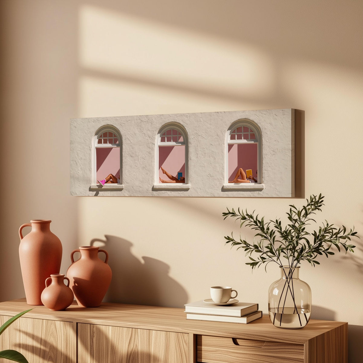 Women reading in three arched windows long horizontal canvas print above a wooden sideboard