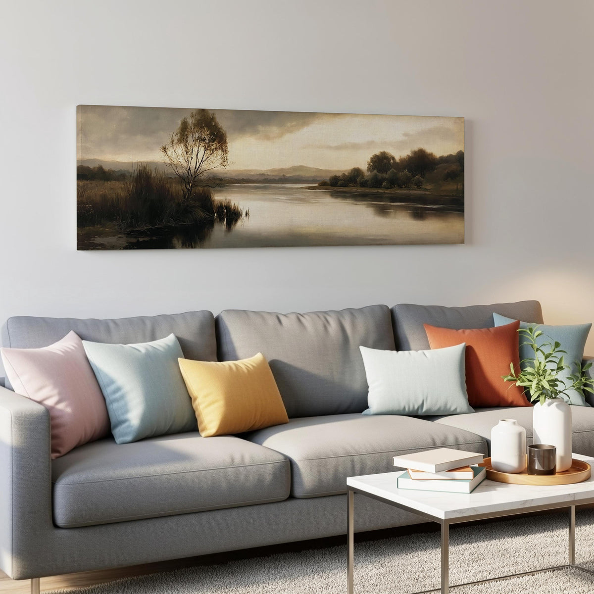Misty river reflection at dusk panoramic canvas print above a grey sofa in a living room