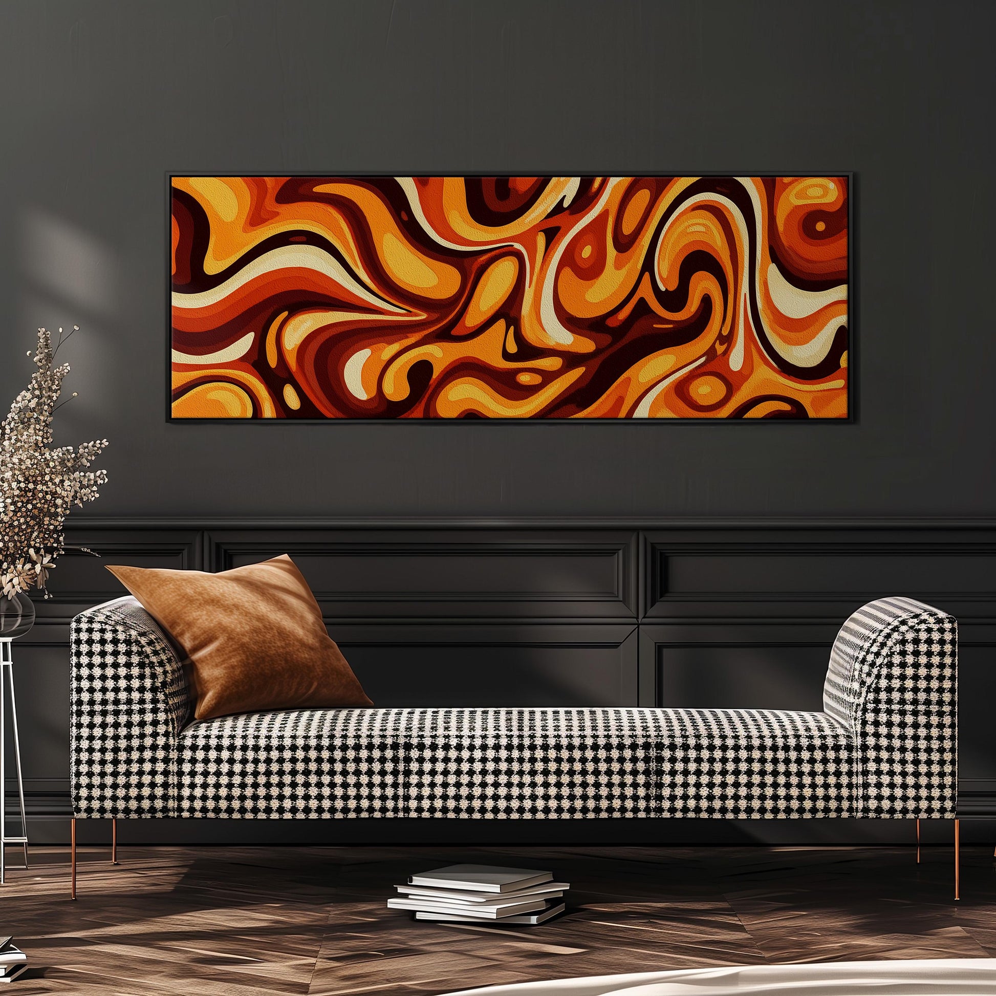 a modern living room with a black and white checkered sofa, a stack of books, and a large abstract painting on the wall.