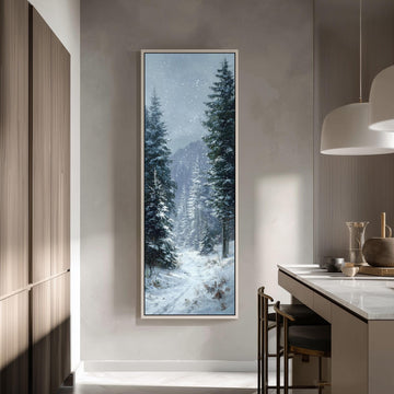 a large, framed painting of a snowy forest scene hanging on a wall in a modern, minimalist kitchen.