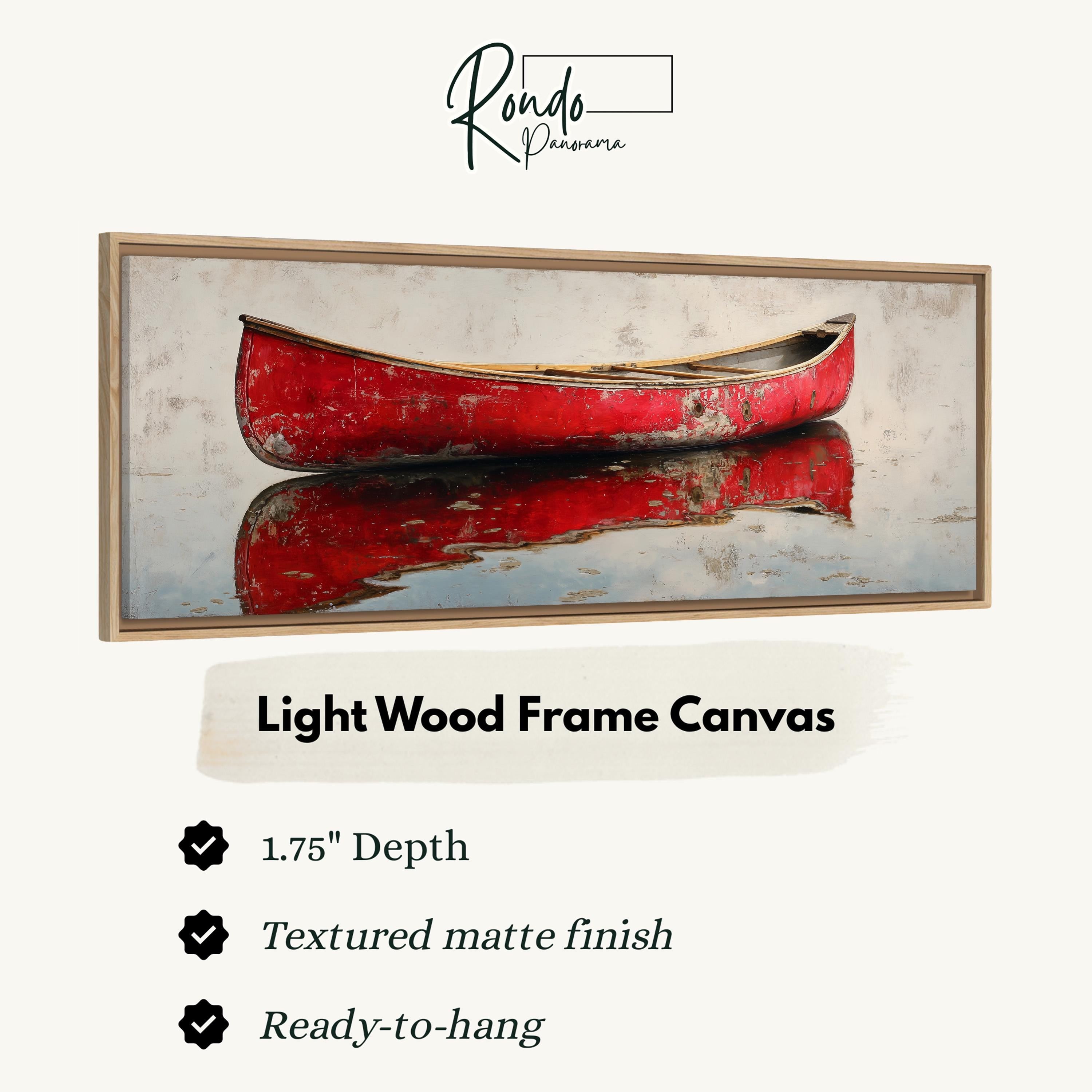 a red canoe on a calm body of water, with a light wood frame canvas hanging above it.