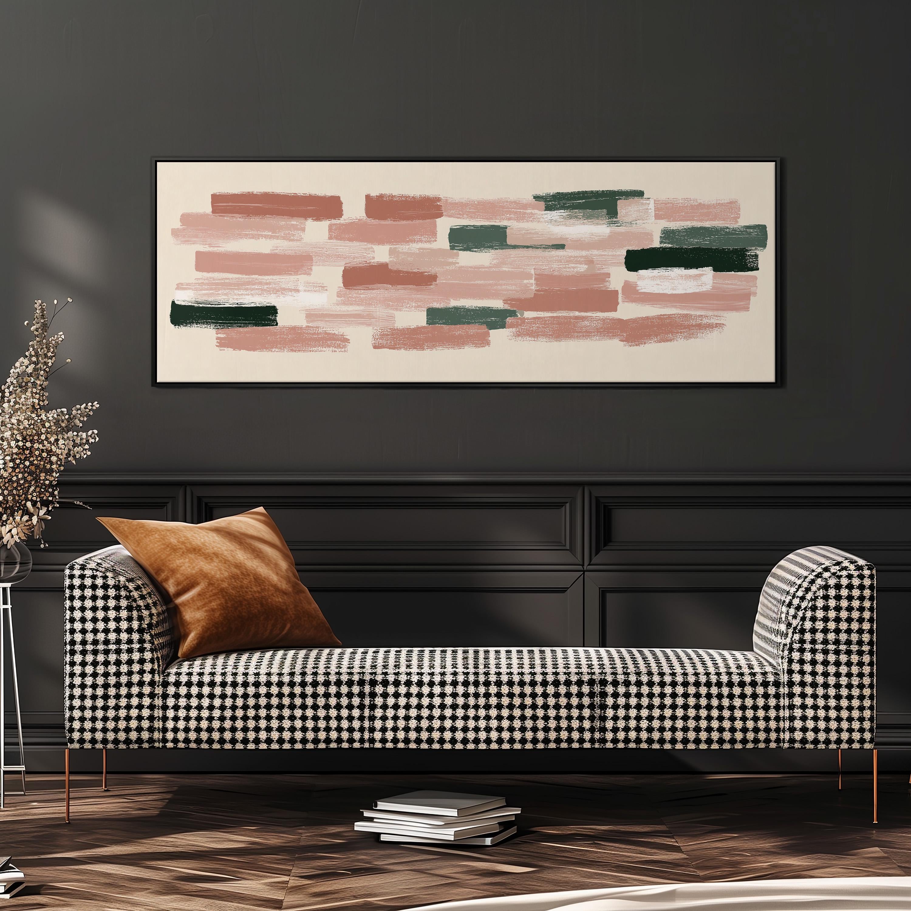 a modern living room with a black and white checkered sofa, a stack of books, and a large abstract painting on the wall.