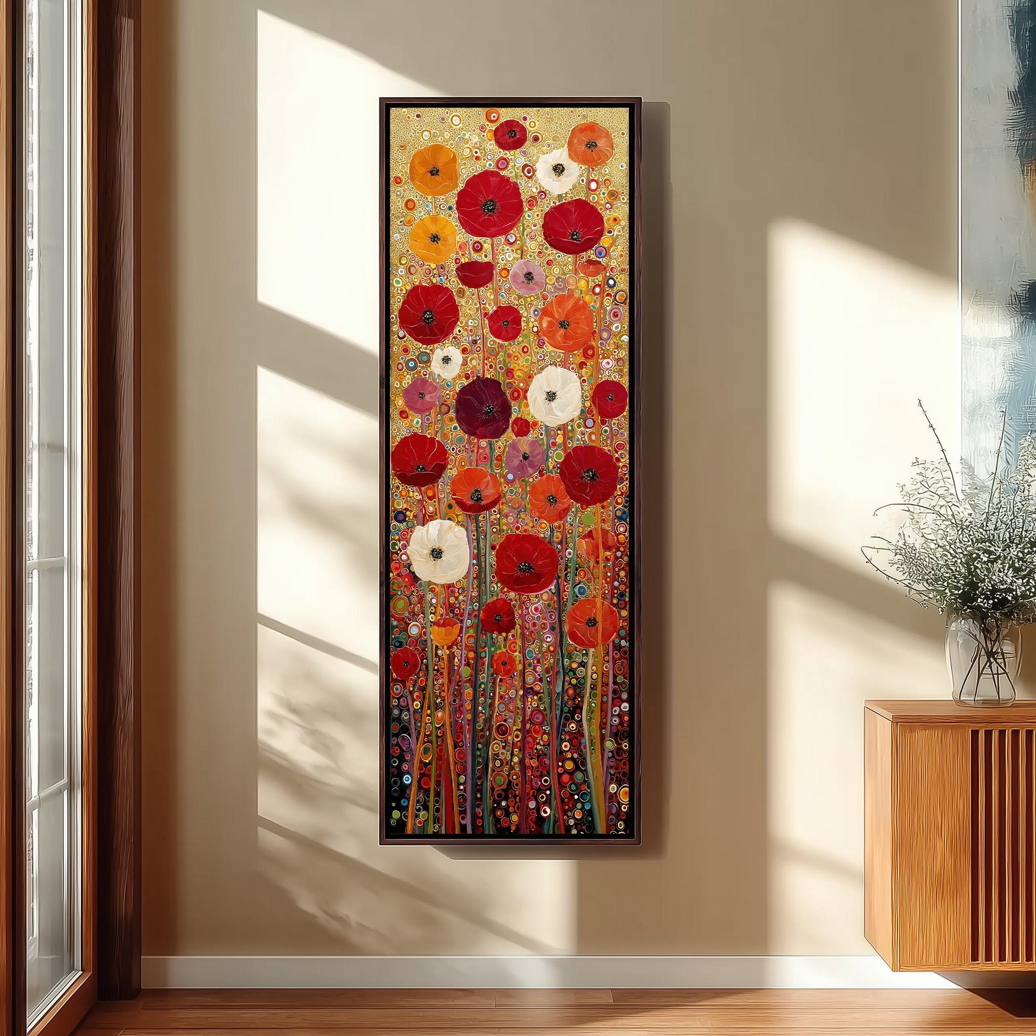 a large, colorful painting of flowers hanging on a wall in a room.