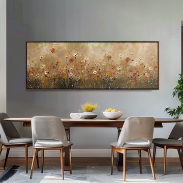 Golden wildflower field long horizontal canvas print above a sofa in a living room