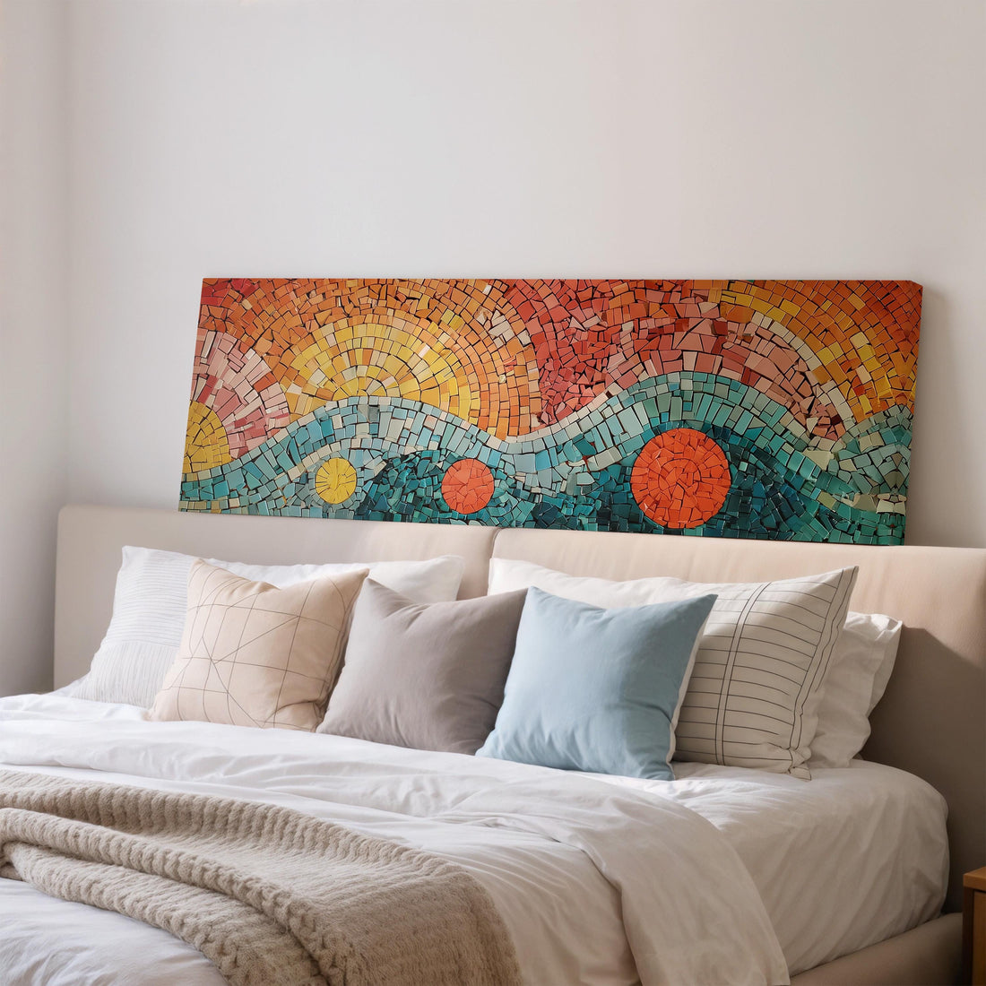 a large, colorful mosaic artwork hanging on a wall above a brown sofa.