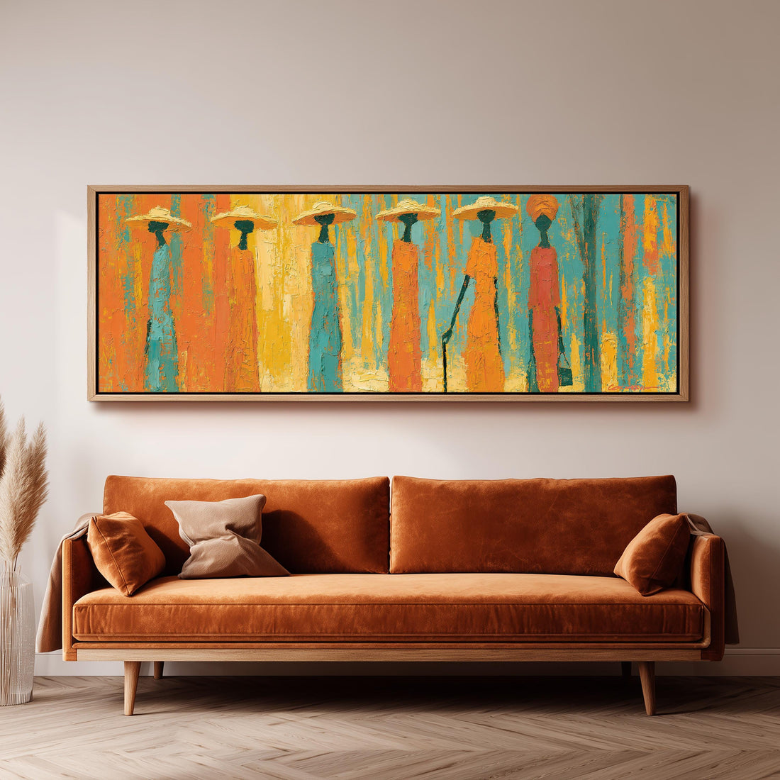 Procession of figures in amber and teal long horizontal canvas print above a sofa in a living room