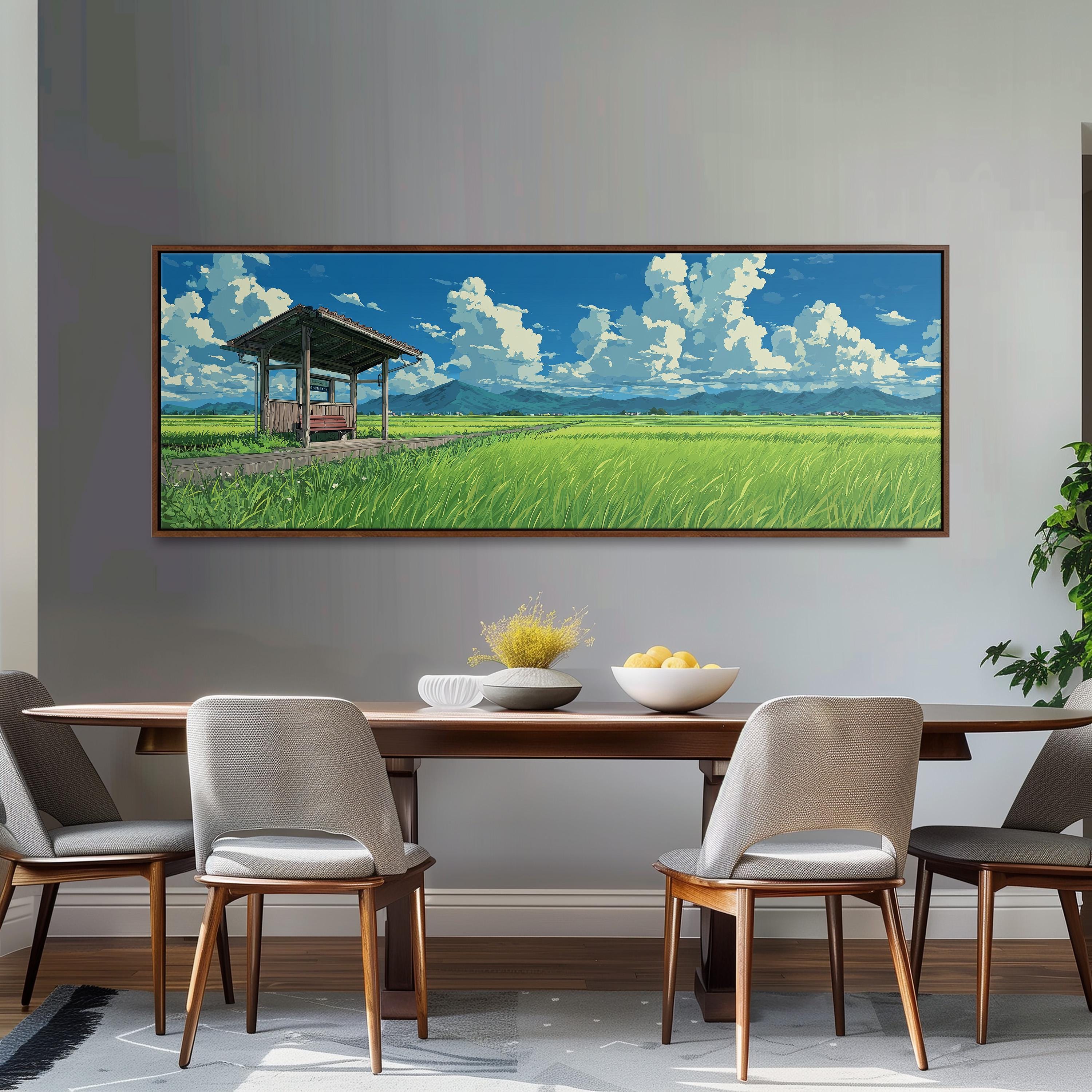 a large painting of a serene landscape with a wooden structure, a field of tall grass, and a blue sky with white clouds. The painting is hung on a wall above a wooden dining table with four chairs.