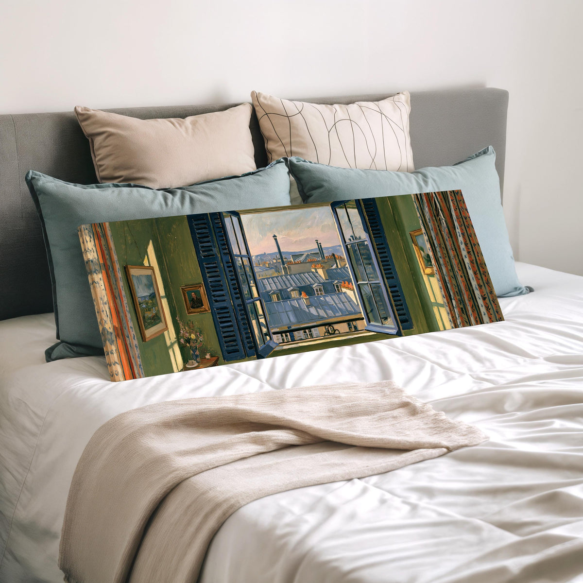 Paris zinc rooftops seen through a green room window wide panoramic canvas print laid on a bed to show its size