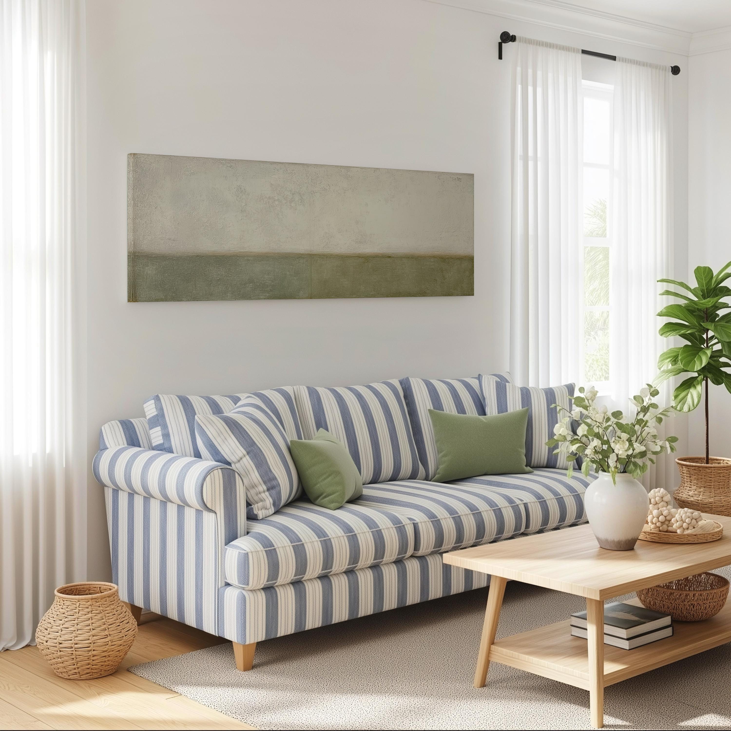 a cozy living room with a striped blue and white sofa, a wooden coffee table, and a large window with white curtains. The room is decorated with a potted plant, a basket, and a vase with flowers, creating a warm and inviting atmosphere.