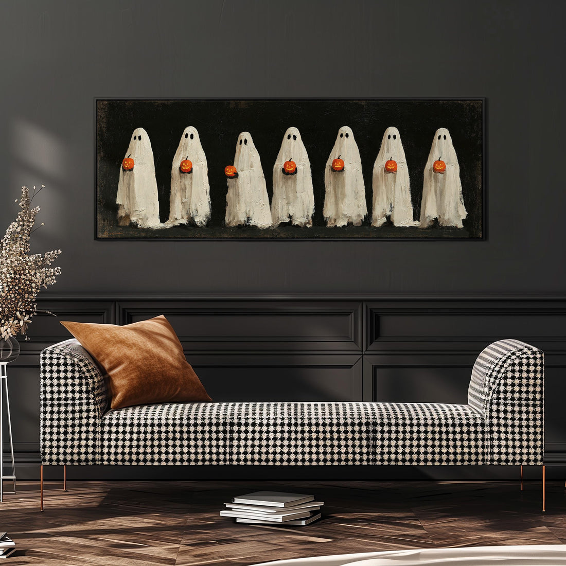 Row of ghosts holding pumpkins long horizontal canvas print above a sofa in a living room