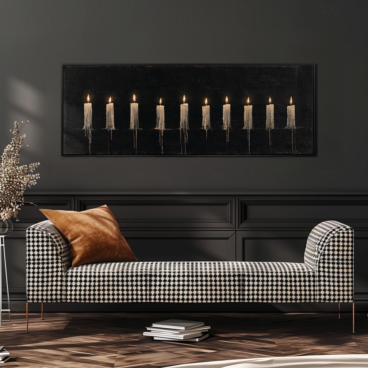 Ten lit candles on black long horizontal canvas print above a sofa in a living room