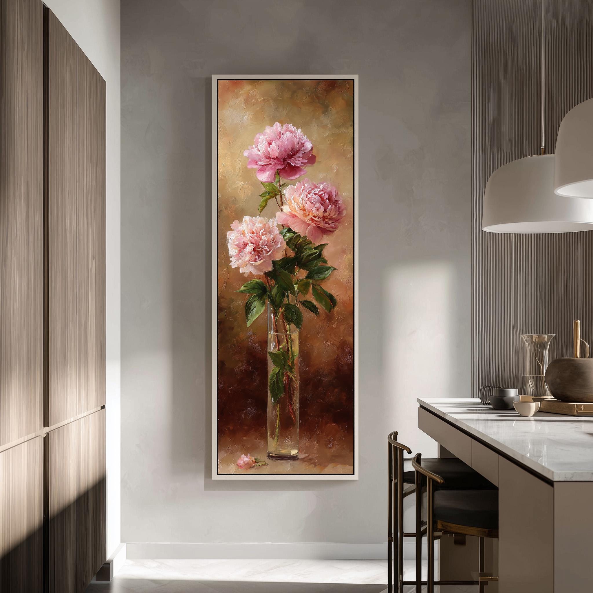 a large framed painting of pink peonies hanging on a wall in a modern kitchen.